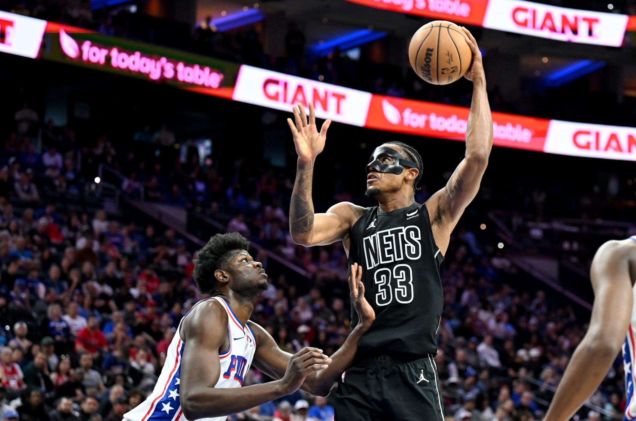 PHILADELPHIA, PENNSYLVANIA - APRIL 14: Nic Claxton #33 of the Brooklyn Nets shoots the ball against Mo Bamba #5 of the Philadelphia 76ers at the Wells Fargo Center on April 14, 2024 in Philadelphia, Pennsylvania. NOTE TO USER: User expressly acknowledges and agrees that, by downloading and or using this photograph, User is consenting to the terms and conditions of the Getty Images License Agreement. (Photo by G Fiume/Getty Images) PHILADELPHIA, PENNSYLVANIA - APRIL 14: Nic Claxton #33 of the Brooklyn Nets shoots the ball against Mo Bamba #5 of the Philadelphia 76ers at the Wells Fargo Center on April 14, 2024 in Philadelphia, Pennsylvania. NOTE TO USER: User expressly acknowledges and agrees that, by downloading and or using this photograph, User is consenting to the terms and conditions of the Getty Images License Agreement. (Photo by G Fiume/Getty Images)