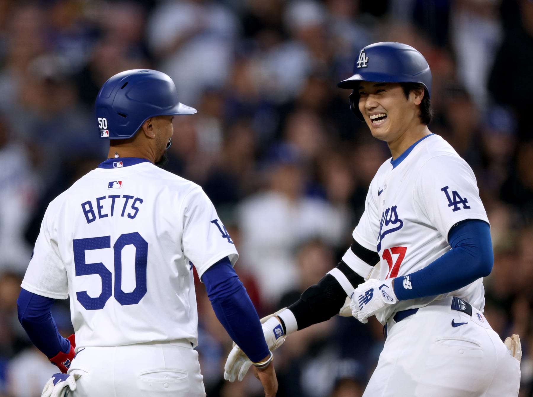 Mookie Betts (L) and Shohei Ohtani (R)