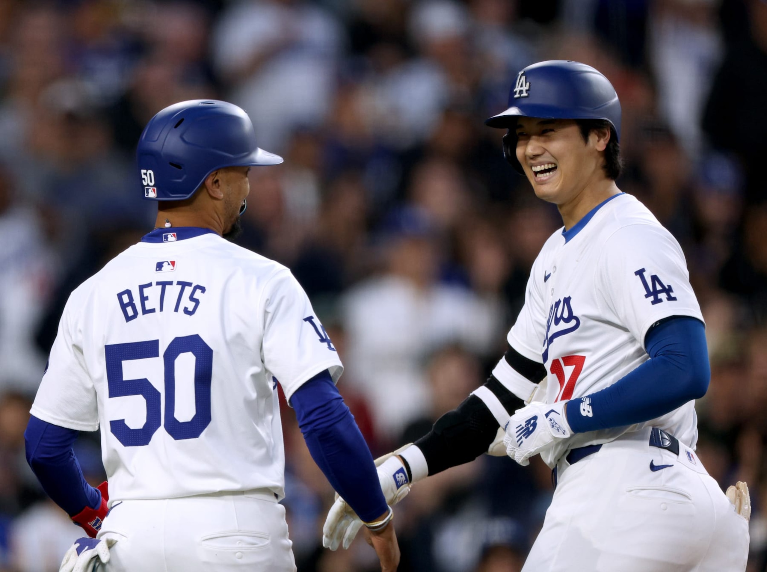 Mookie Betts (L) and Shohei Ohtani (R)