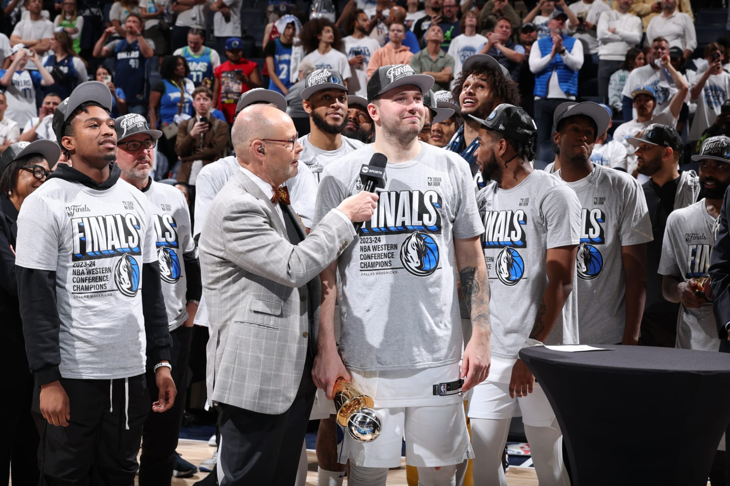 MINNEAPOLIS, MN - MAY 30: Luka Doncic #77 of the Dallas Mavericks celebrates with the Earvin "Magic" Johnson Trophy after the game against the Minnesota Timberwolves during Game 5 of the Western Conference Finals during the 2024 NBA Playoffs on May 30, 2024 at Target Center in Minneapolis, Minnesota. NOTE TO USER: User expressly acknowledges and agrees that, by downloading and or using this Photograph, user is consenting to the terms and conditions of the Getty Images License Agreement. Mandatory Copyright Notice: Copyright 2024 NBAE (Photo by David Sherman/NBAE via Getty Images)