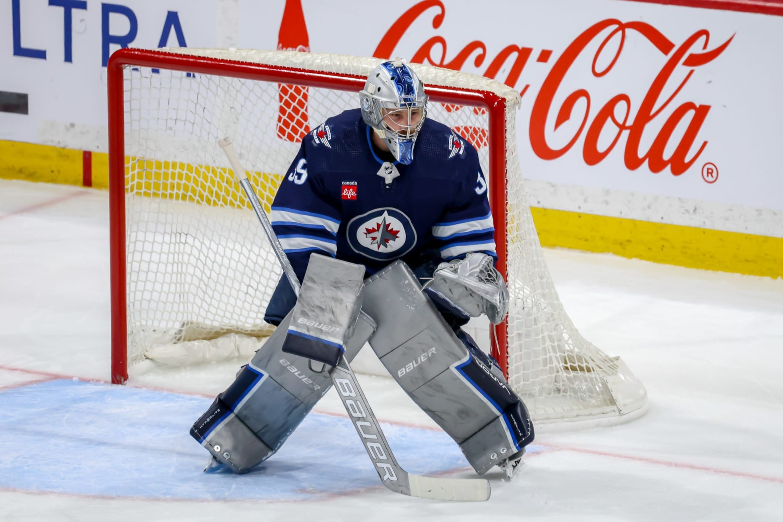 WINNIPEG, CANADA - APRIL 18: Goaltender Laurent Brossoit #39 of the Winnipeg Jets guards the net during first period action against the Vancouver Canucks at the Canada Life Centre on April 18, 2024 in Winnipeg, Manitoba, Canada. (Photo by Jonathan Kozub/NHLI via Getty Images)