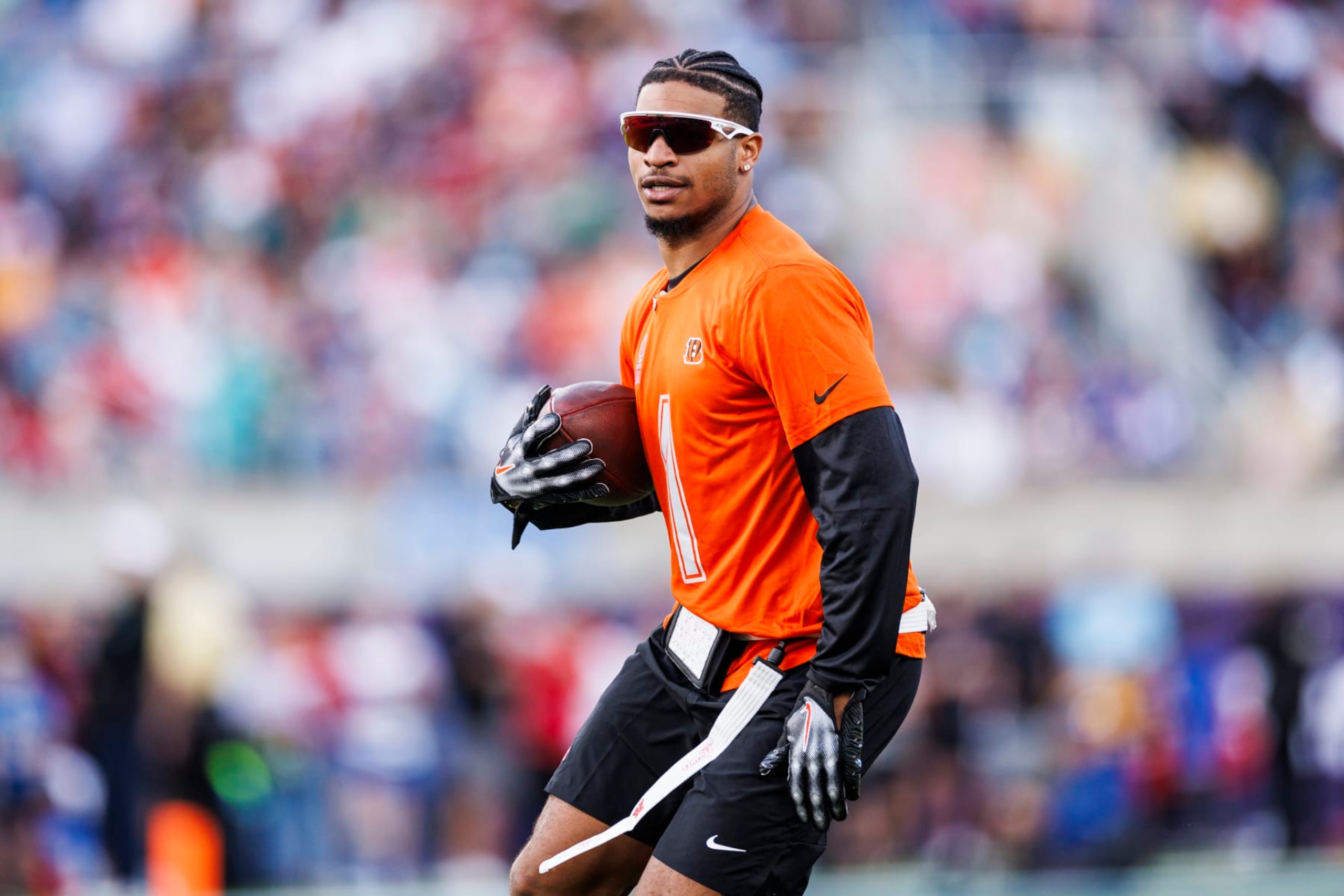 ORLANDO, FLORIDA - FEBRUARY 04:  Ja’Marr Chase #1 of the Cincinnati Bengals and AFC runs with the ball during the 2024 NFL Pro Bowl at Camping World Stadium on February 04, 2024 in Orlando, Florida. (Photo by James Gilbert/Getty Images)
