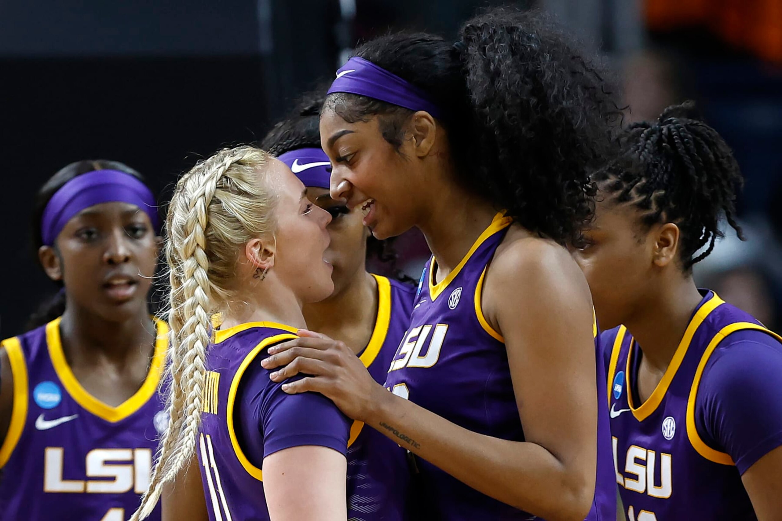 ALBANY, NEW YORK - MARCH 30: Angel Reese #10 of the LSU Tigers reacts with Hailey Van Lith #11 of the LSU Tigers in a game against the UCLA Bruins during the second half in the Sweet 16 round of the NCAA Women's Basketball Tournament at MVP Arena on March 30, 2024 in Albany, New York. (Photo by Sarah Stier/Getty Images)
