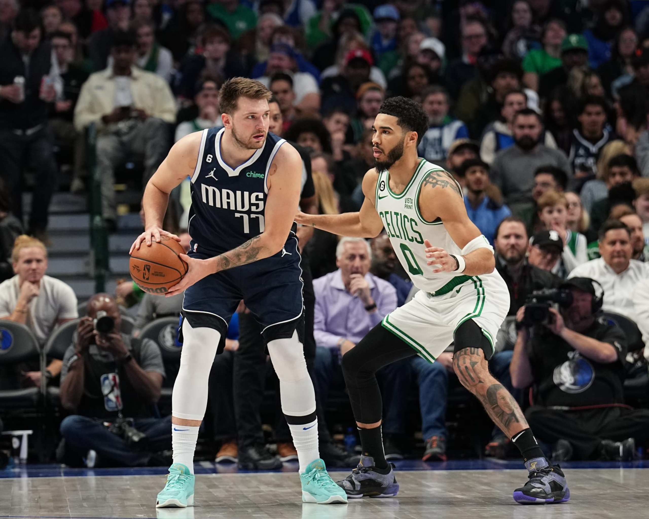 DALLAS, TX - JANUARY 5: Jayson Tatum #0 of the Boston Celtics guards Luka Doncic #77 of the Dallas Mavericks during the game between the Boston Celtics and the Dallas Mavericks on January 5, 2022 at the American Airlines Center in Dallas, Texas. NOTE TO USER: User expressly acknowledges and agrees that, by downloading and or using this photograph, User is consenting to the terms and conditions of the Getty Images License Agreement. Mandatory Copyright Notice: Copyright 2023 NBAE (Photo by Glenn James/NBAE via Getty Images)