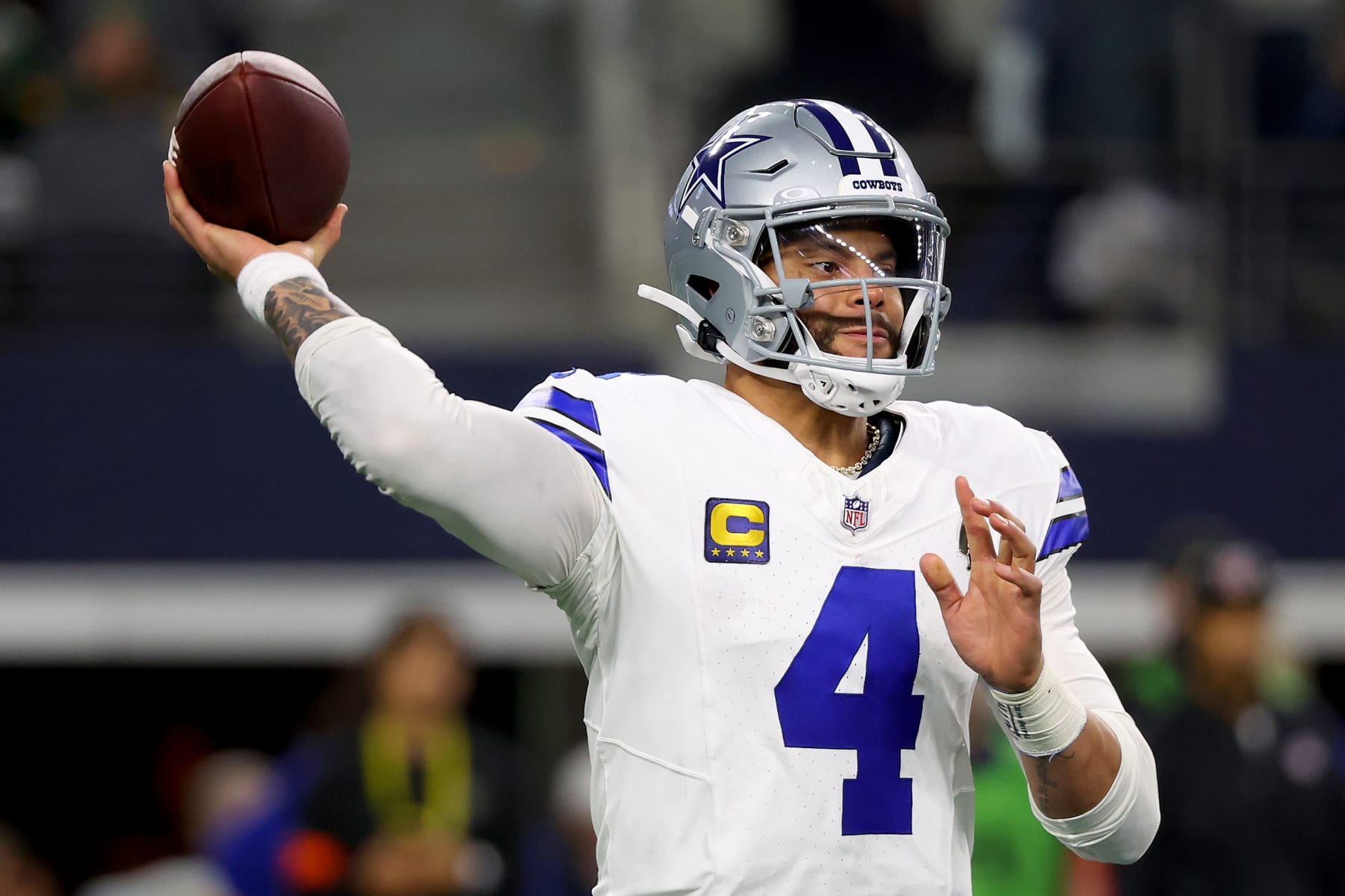 ARLINGTON, TEXAS - JANUARY 14: Dak Prescott #4 of the Dallas Cowboys throws a pass during the NFC Wild Card Playoff game against the Green Bay Packers at AT&T Stadium on January 14, 2024 in Arlington, Texas. (Photo by Richard Rodriguez/Getty Images) ARLINGTON, TEXAS - JANUARY 14: Dak Prescott #4 of the Dallas Cowboys throws a pass during the NFC Wild Card Playoff game against the Green Bay Packers at AT&T Stadium on January 14, 2024 in Arlington, Texas. (Photo by Richard Rodriguez/Getty Images)
