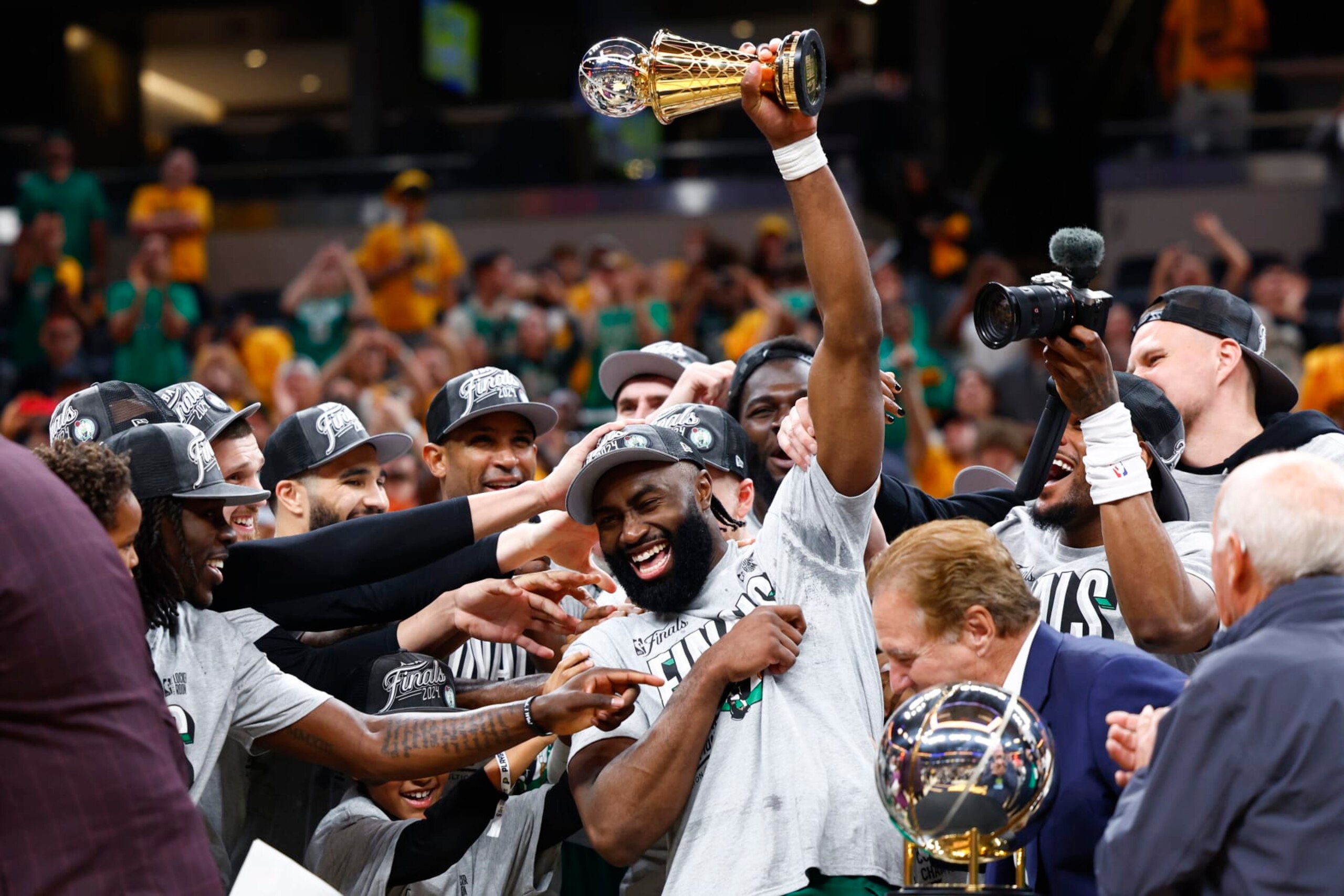 Indianapolis, IN - May 27: Boston Celtics guard Jaylen Brown holds up the Larry Bird trophy after being named 2024 Eastern Conference Finals MVP. (Photo by Danielle Parhizkaran/The Boston Globe via Getty Images) Indianapolis, IN - May 27: Boston Celtics guard Jaylen Brown holds up the Larry Bird trophy after being named 2024 Eastern Conference Finals MVP. (Photo by Danielle Parhizkaran/The Boston Globe via Getty Images)