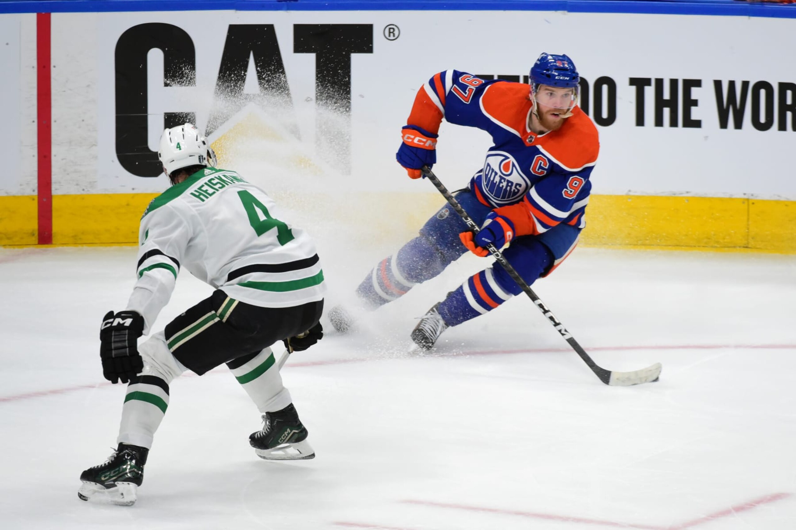 EDMONTON, CANADA  JUNE 2: Connor McDavid #97 of the Edmonton Oilers skates against Miro Heiskanen #4 of the Dallas Stars in the second period of Game Six of the Western Conference Final of the 2024 Stanley Cup Playoffs at Rogers Place on June 2, 2024, in Edmonton, Alberta, Canada. (Photo by Leila Devlin/Getty Images)