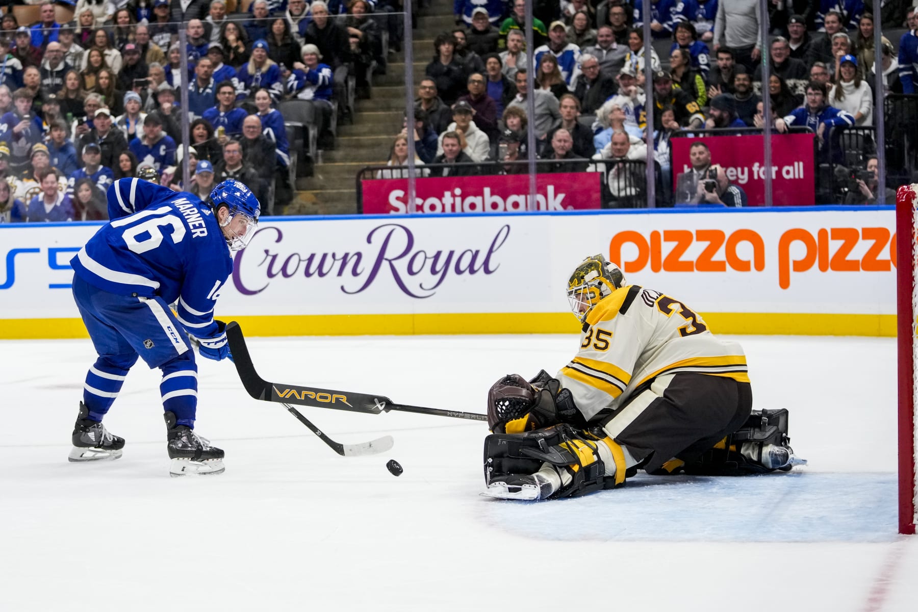 Toronto Maple Leafs winger Mitch Marner and Boston Bruins goalie Linus Ullmark. 