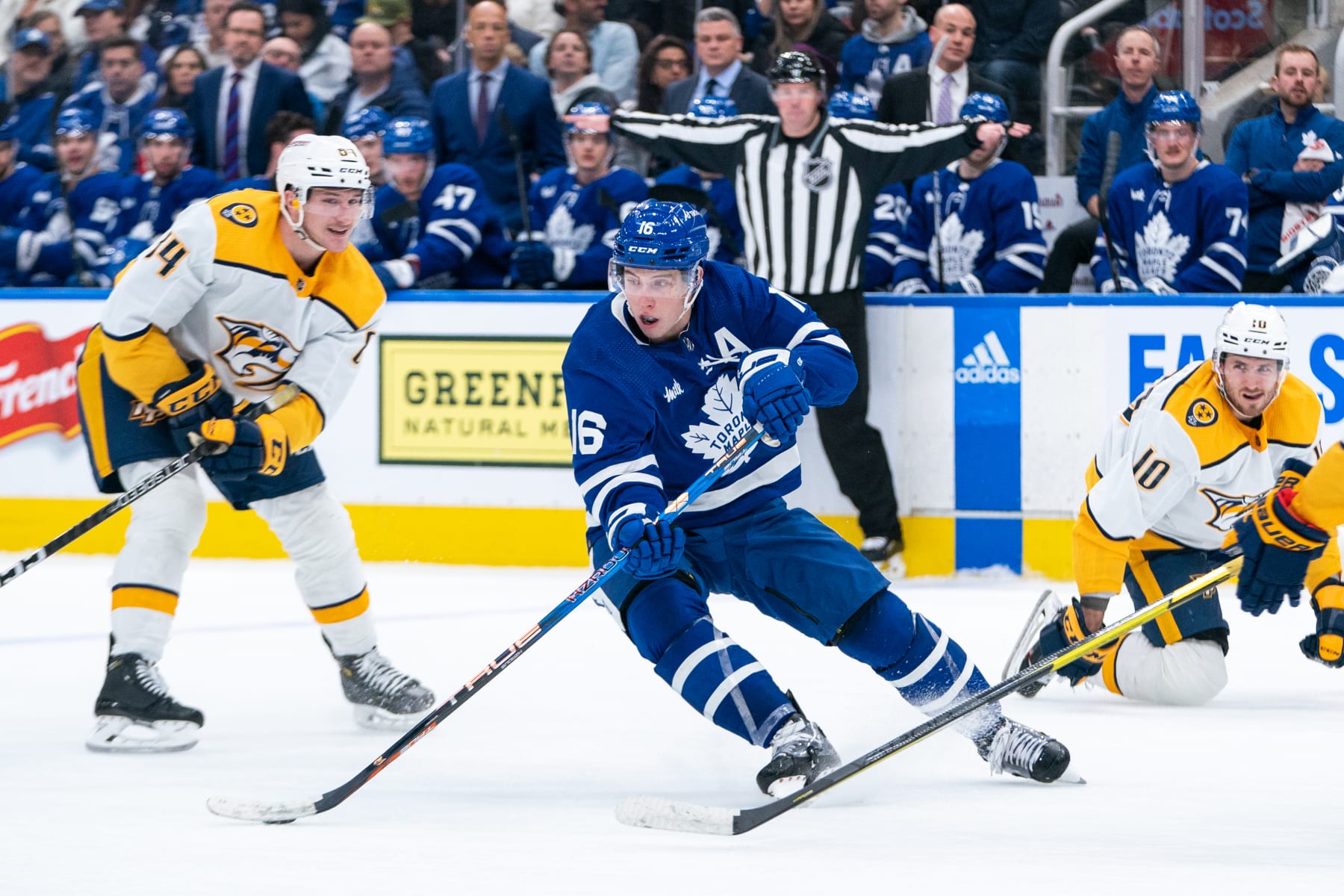 TORONTO, CANADA - JANUARY 11: Mitchell Marner #16 of the Toronto Maple Leafs plays the puck against the Nashville Predators at the Scotiabank Arena on January 11, 2023 in Toronto, Ontario, Canada. (Photo by Michael Chisholm/NHLI via Getty Images)