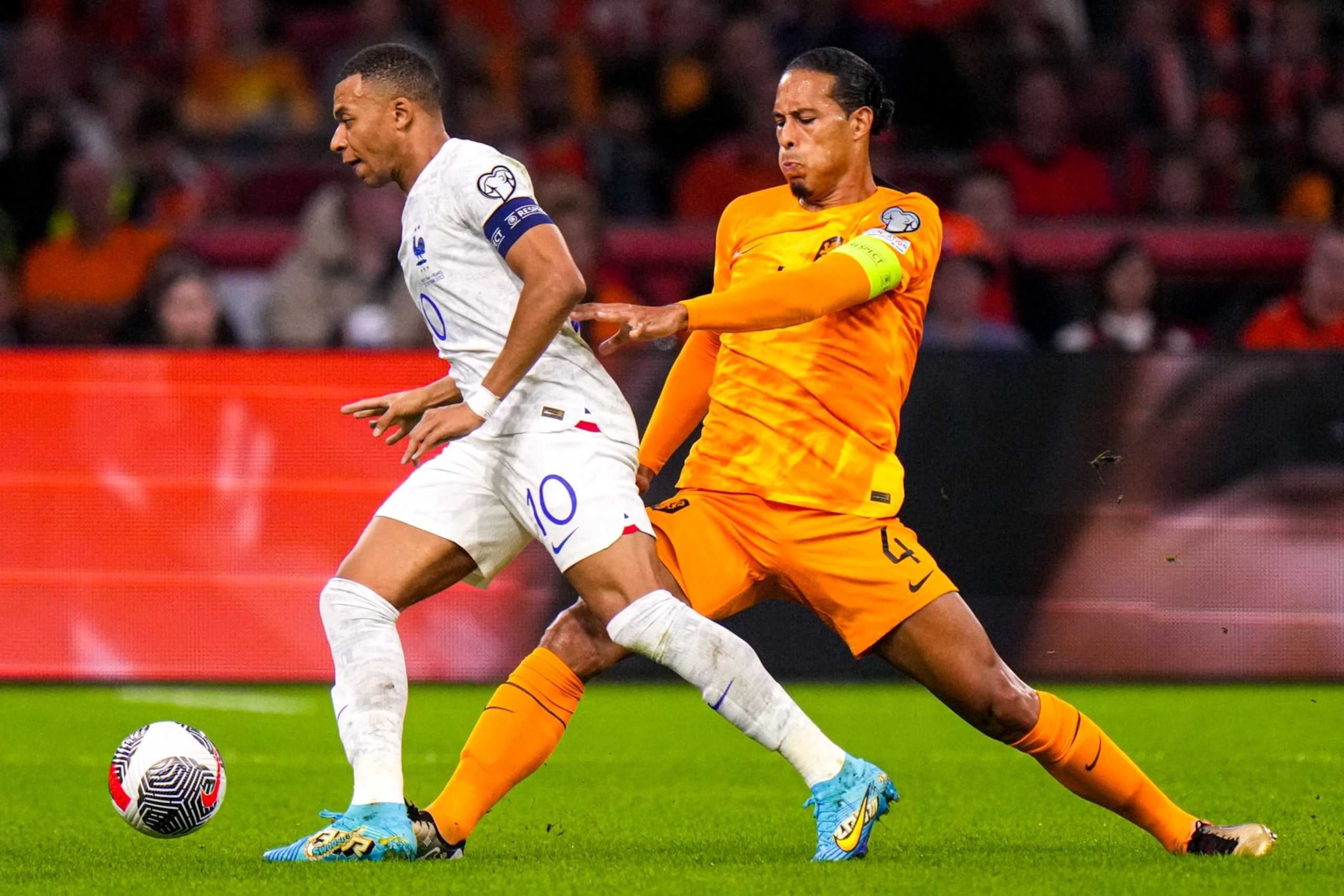 Kylian Mbappé and Virgil Van Dijk. Kylian Mbappé and Virgil Van Dijk.