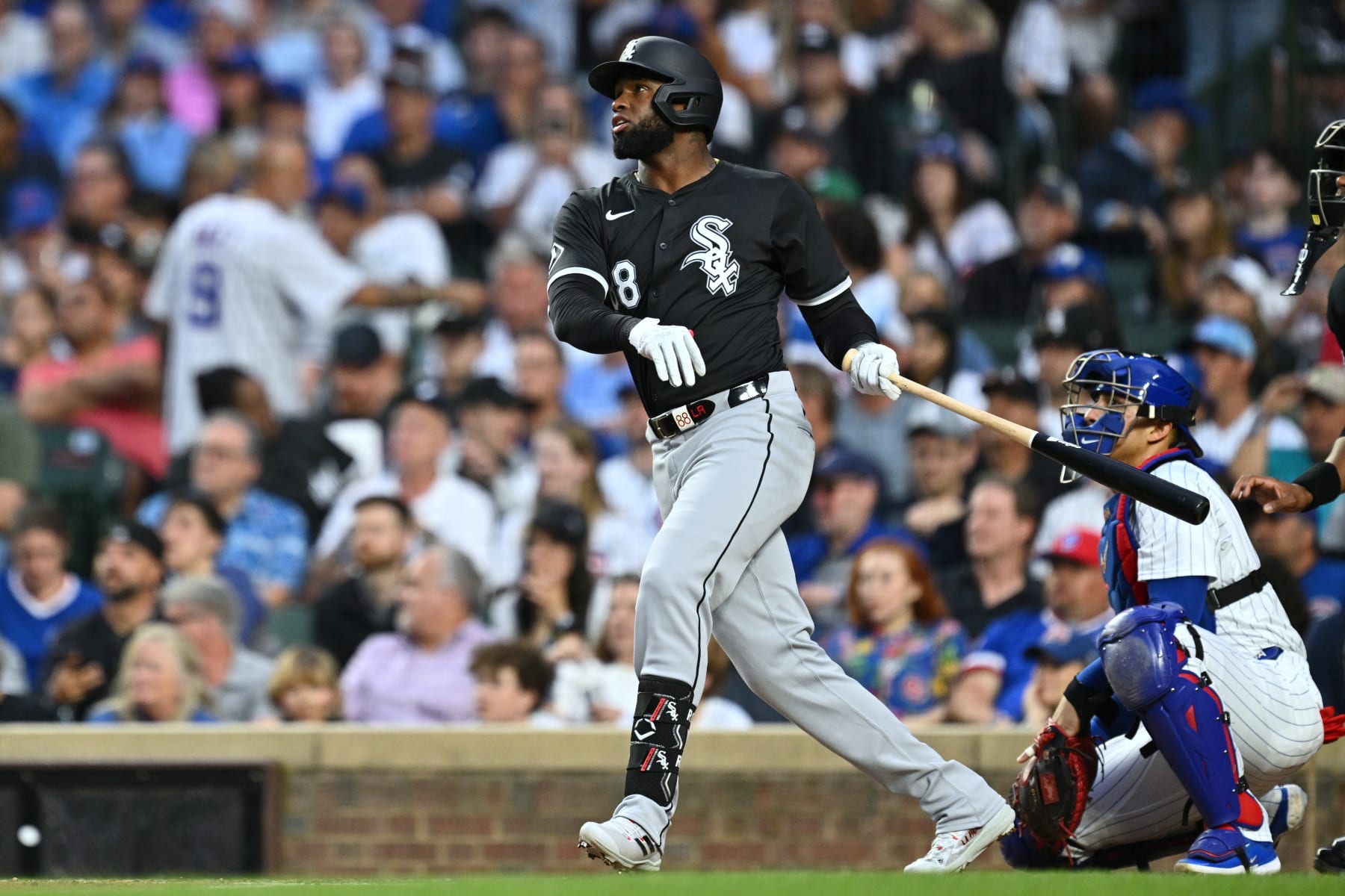 CHICAGO, IL - JUNE 04:  Luis Robert Jr. #88 of the Chicago White Sox hits a single in the fourth inning against the Chicago Cubs at Wrigley Field on June 04, 2024 in Chicago, Illinois.  (Photo by Jamie Sabau/Getty Images)