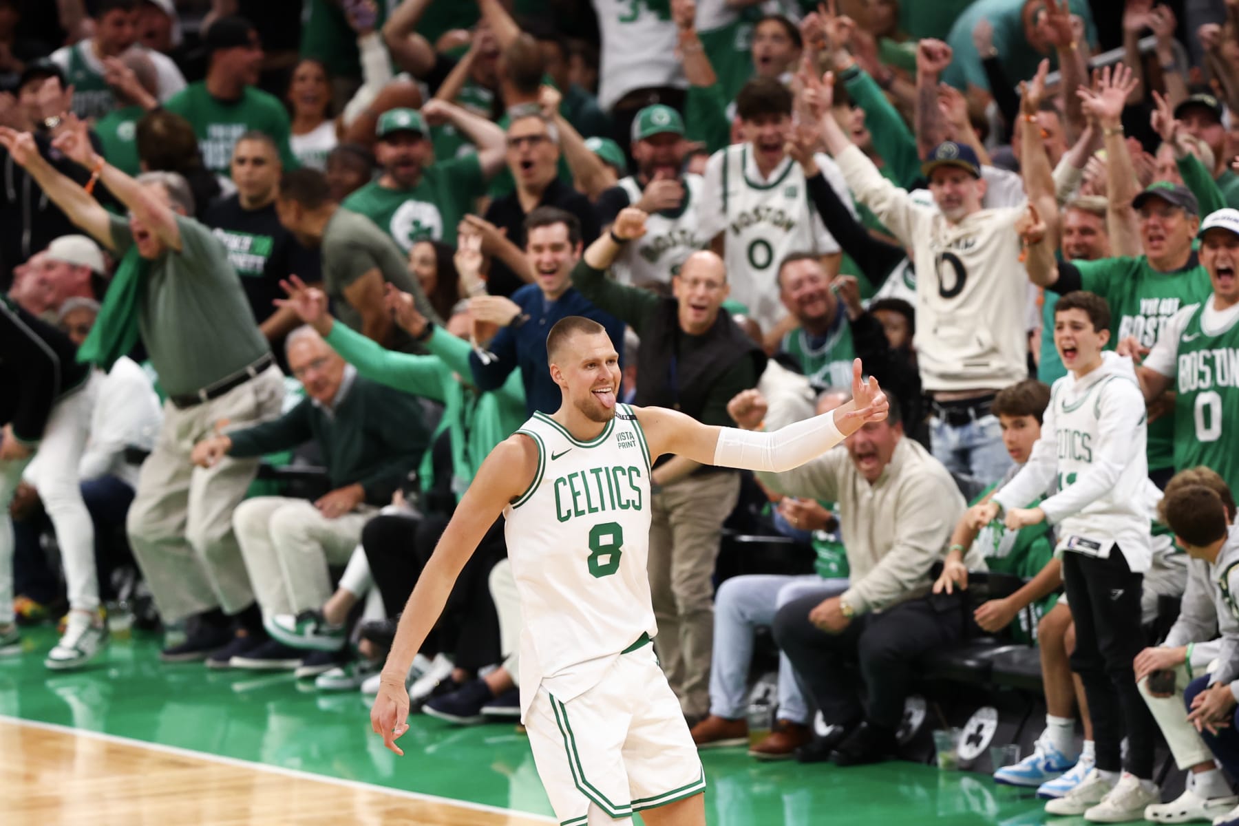 BOSTON, MASSACHUSETTS - JUNE 06: Kristaps Porzingis #8 of the Boston Celtics reacts during the first quarter against the Dallas Mavericks in Game One of the 2024 NBA Finals at TD Garden on June 06, 2024 in Boston, Massachusetts. NOTE TO USER: User expressly acknowledges and agrees that, by downloading and or using this photograph, User is consenting to the terms and conditions of the Getty Images License Agreement. (Photo by Maddie Meyer/Getty Images)