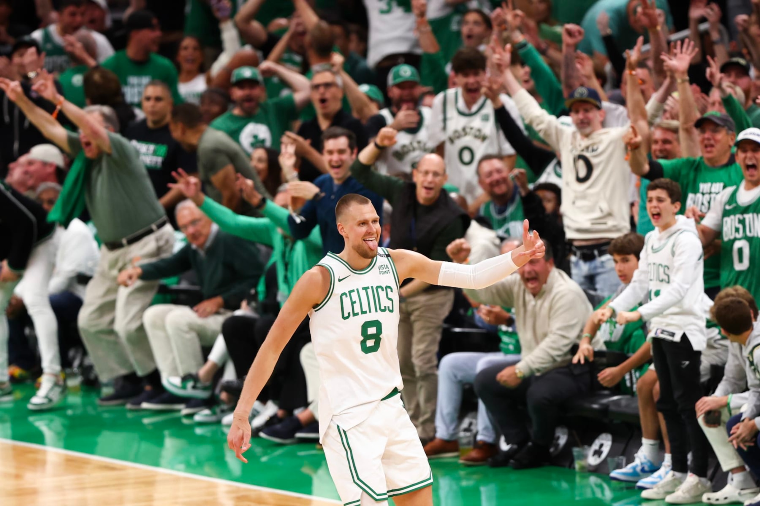BOSTON, MASSACHUSETTS - JUNE 06: Kristaps Porzingis #8 of the Boston Celtics reacts during the first quarter against the Dallas Mavericks in Game One of the 2024 NBA Finals at TD Garden on June 06, 2024 in Boston, Massachusetts. NOTE TO USER: User expressly acknowledges and agrees that, by downloading and or using this photograph, User is consenting to the terms and conditions of the Getty Images License Agreement. (Photo by Maddie Meyer/Getty Images)