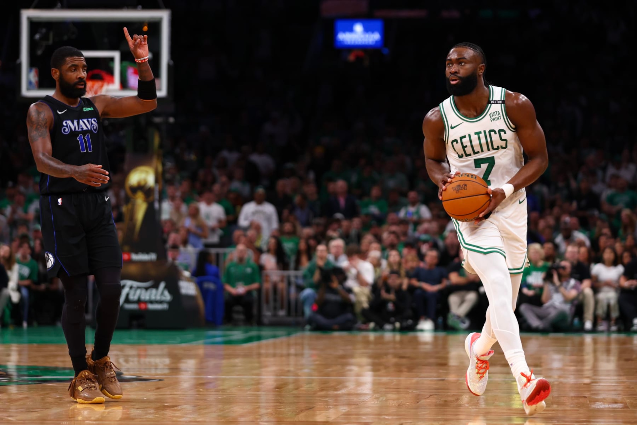BOSTON, MASSACHUSETTS - JUNE 06: Jaylen Brown #7 of the Boston Celtics dribbles the ball against Kyrie Irving #11 of the Dallas Mavericks during the second quarter in Game One of the 2024 NBA Finals at TD Garden on June 06, 2024 in Boston, Massachusetts. NOTE TO USER: User expressly acknowledges and agrees that, by downloading and or using this photograph, User is consenting to the terms and conditions of the Getty Images License Agreement. (Photo by Maddie Meyer/Getty Images)