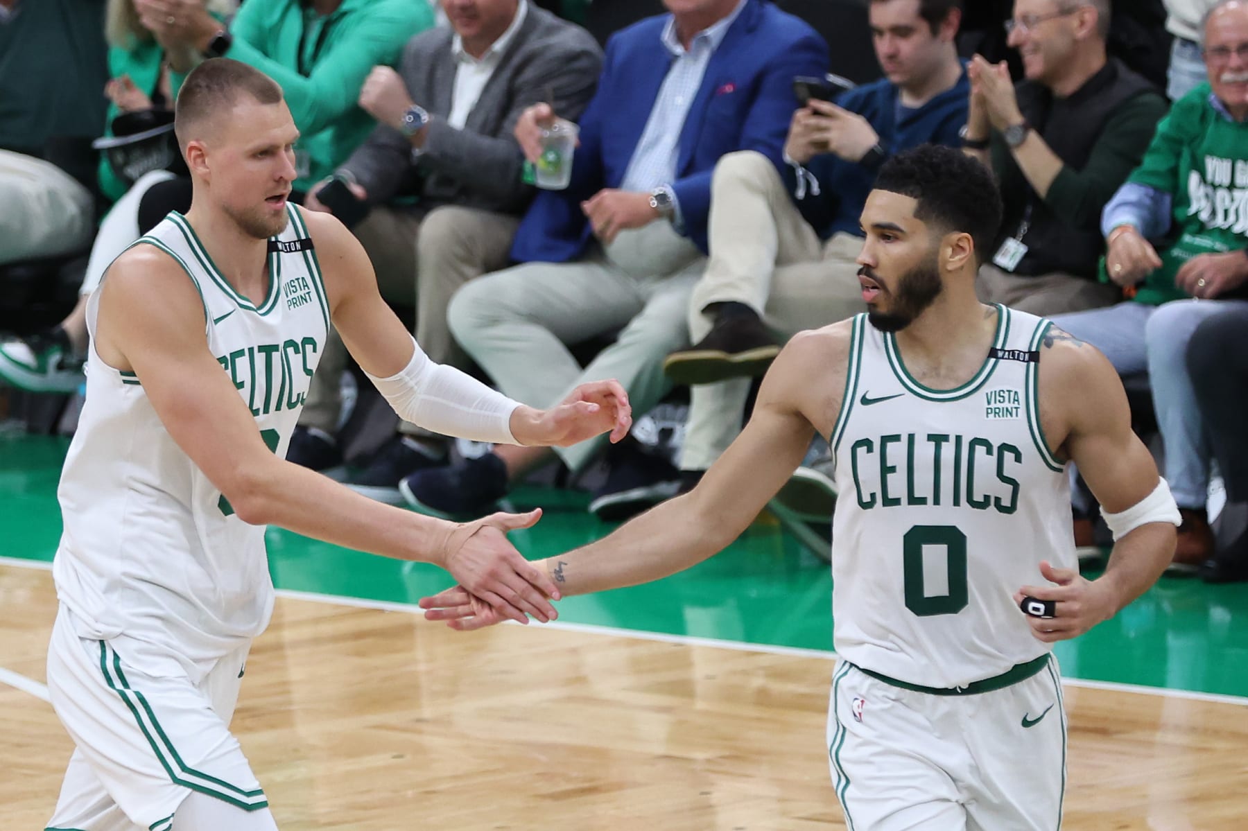 Kristaps PorziÅÄ£is and Jayson Tatum