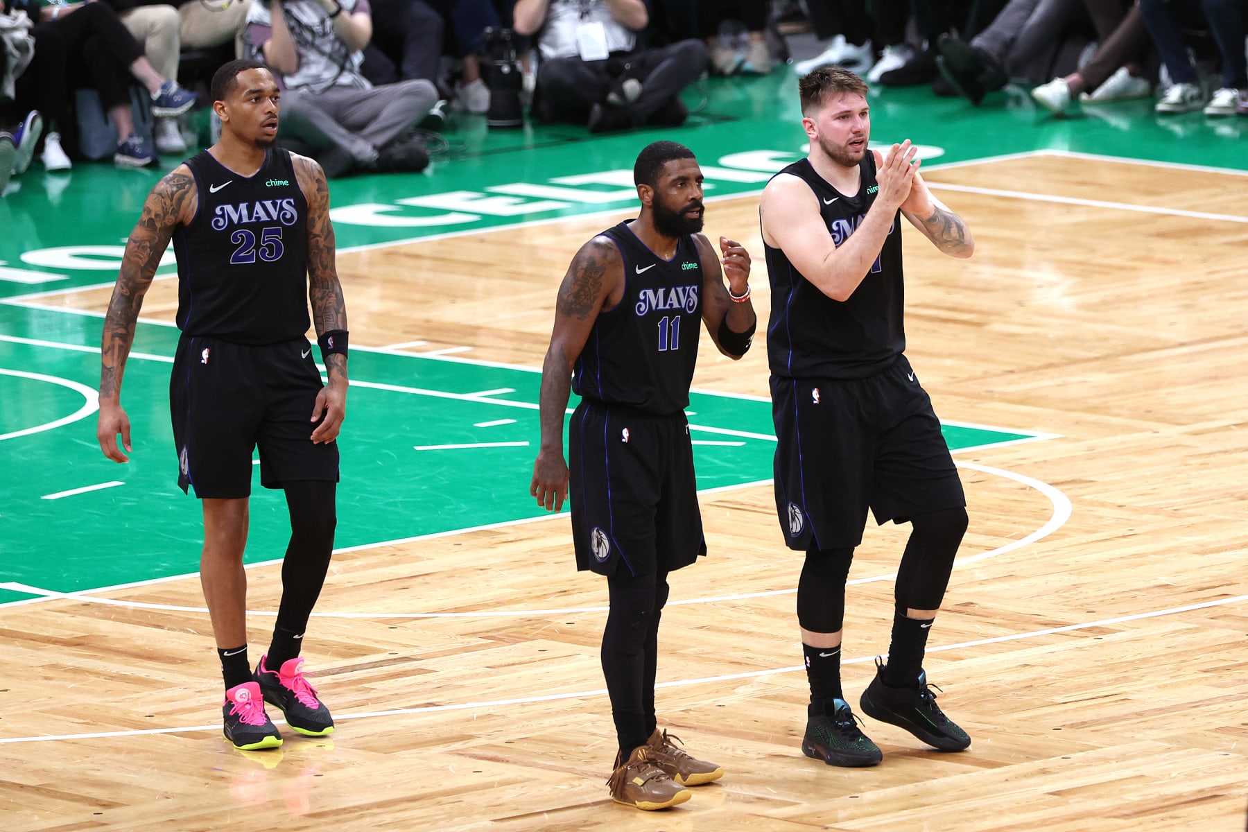 P.J. Washington, Kyrie Irving and Luka DonÄiÄ