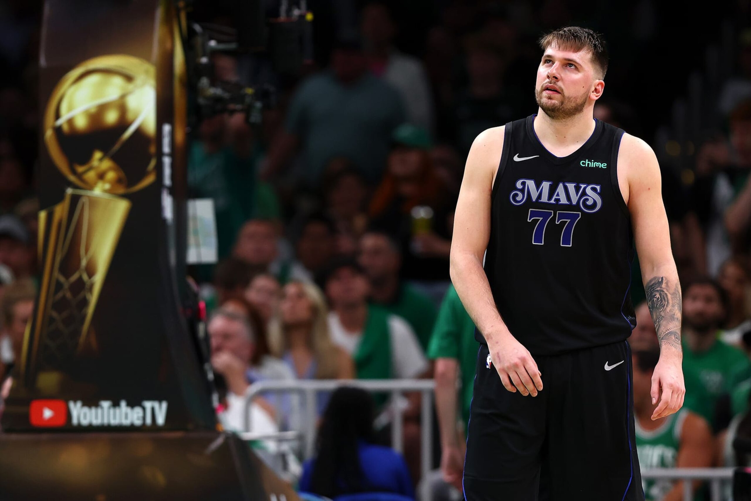 BOSTON, MASSACHUSETTS - JUNE 06: Luka Doncic #77 of the Dallas Mavericks looks on during the fourth quarter against the Boston Celtics in Game One of the 2024 NBA Finals at TD Garden on June 06, 2024 in Boston, Massachusetts. NOTE TO USER: User expressly acknowledges and agrees that, by downloading and or using this photograph, User is consenting to the terms and conditions of the Getty Images License Agreement. (Photo by Maddie Meyer/Getty Images) BOSTON, MASSACHUSETTS - JUNE 06: Luka Doncic #77 of the Dallas Mavericks looks on during the fourth quarter against the Boston Celtics in Game One of the 2024 NBA Finals at TD Garden on June 06, 2024 in Boston, Massachusetts. NOTE TO USER: User expressly acknowledges and agrees that, by downloading and or using this photograph, User is consenting to the terms and conditions of the Getty Images License Agreement. (Photo by Maddie Meyer/Getty Images)