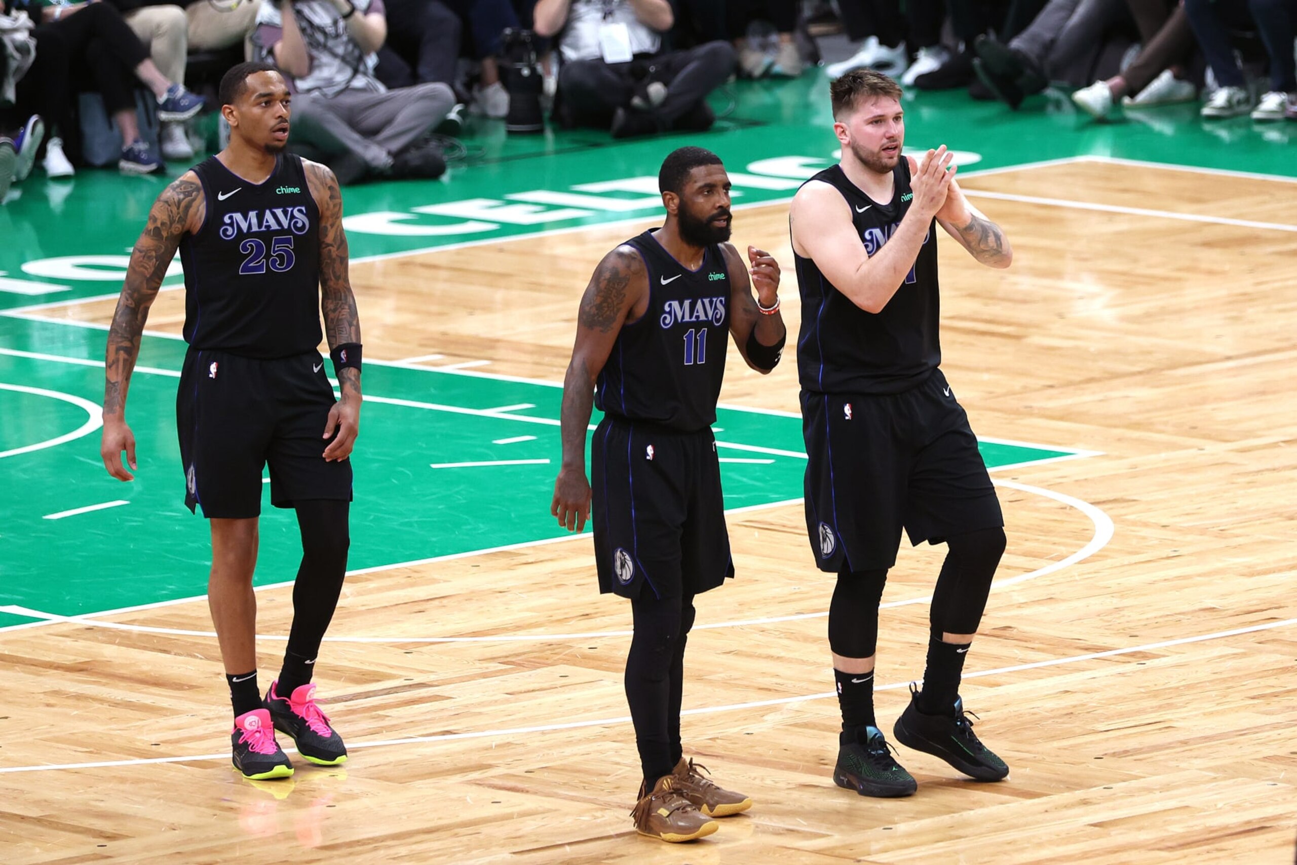 BOSTON, MASSACHUSETTS - JUNE 06: Luka Doncic #77 and Kyrie Irving #11 of the Dallas Mavericks react during the third quarter against the Boston Celtics in Game One of the 2024 NBA Finals at TD Garden on June 06, 2024 in Boston, Massachusetts. NOTE TO USER: User expressly acknowledges and agrees that, by downloading and or using this photograph, User is consenting to the terms and conditions of the Getty Images License Agreement. (Photo by Adam Glanzman/Getty Images) BOSTON, MASSACHUSETTS - JUNE 06: Luka Doncic #77 and Kyrie Irving #11 of the Dallas Mavericks react during the third quarter against the Boston Celtics in Game One of the 2024 NBA Finals at TD Garden on June 06, 2024 in Boston, Massachusetts. NOTE TO USER: User expressly acknowledges and agrees that, by downloading and or using this photograph, User is consenting to the terms and conditions of the Getty Images License Agreement. (Photo by Adam Glanzman/Getty Images)