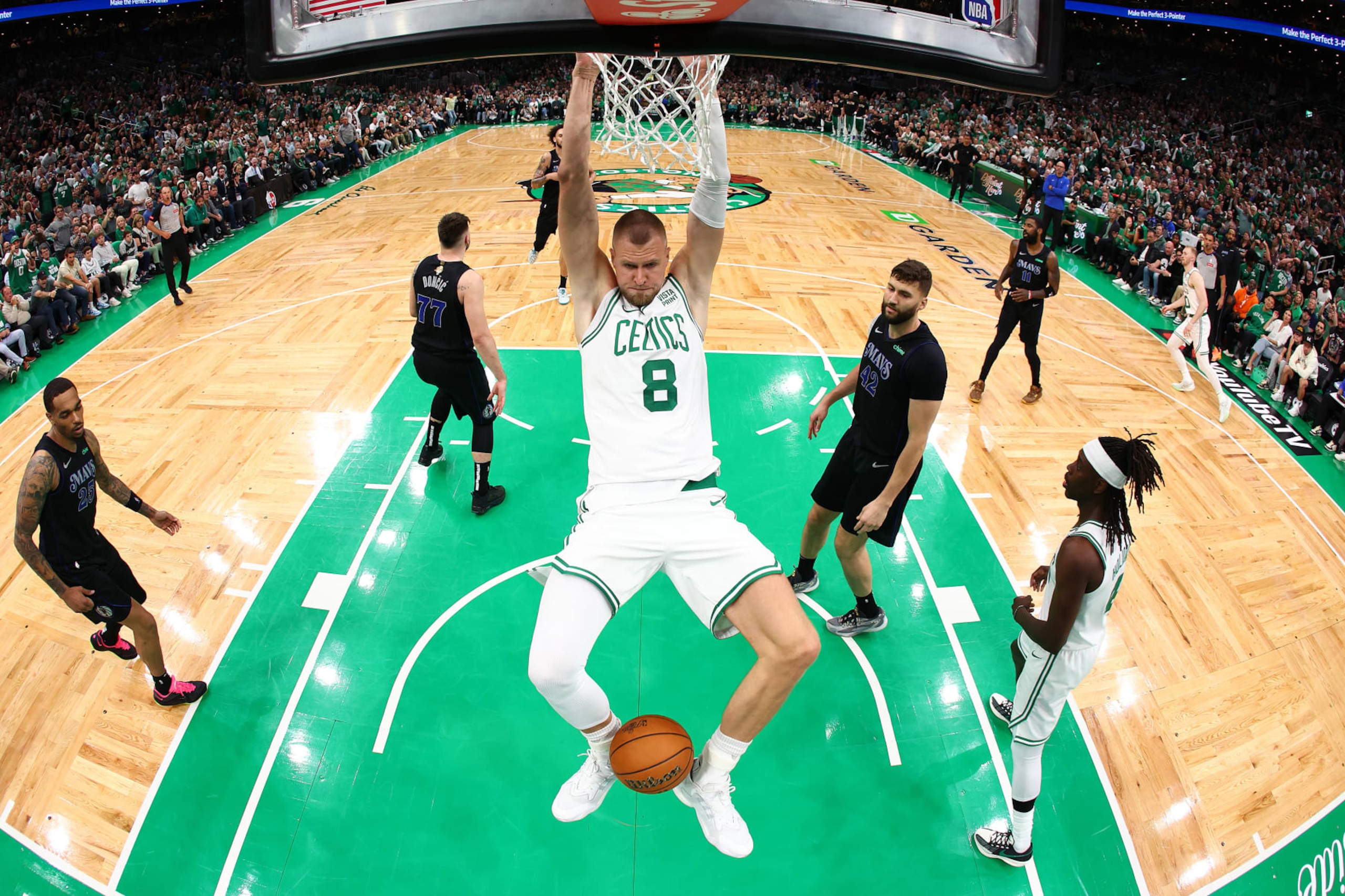 BOSTON, MASSACHUSETTS - JUNE 06: Kristaps Porzingis #8 of the Boston Celtics dunks the ball during the first quarter against the Dallas Mavericks in Game One of the 2024 NBA Finals at TD Garden on June 06, 2024 in Boston, Massachusetts. NOTE TO USER: User expressly acknowledges and agrees that, by downloading and or using this photograph, User is consenting to the terms and conditions of the Getty Images License Agreement. (Photo by Maddie Meyer/Getty Images) BOSTON, MASSACHUSETTS - JUNE 06: Kristaps Porzingis #8 of the Boston Celtics dunks the ball during the first quarter against the Dallas Mavericks in Game One of the 2024 NBA Finals at TD Garden on June 06, 2024 in Boston, Massachusetts. NOTE TO USER: User expressly acknowledges and agrees that, by downloading and or using this photograph, User is consenting to the terms and conditions of the Getty Images License Agreement. (Photo by Maddie Meyer/Getty Images)