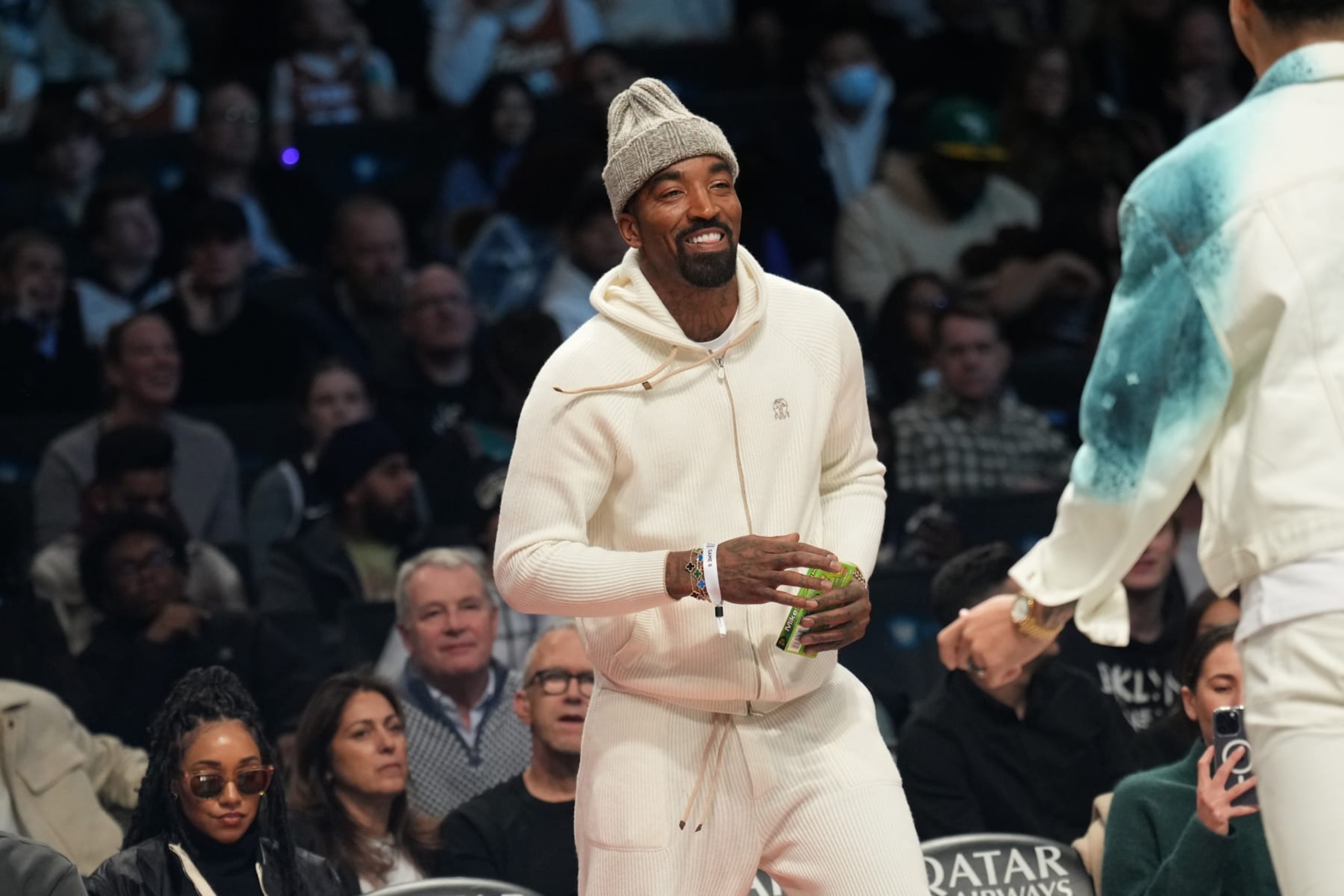 BROOKLYN, NY - NOVEMBER 20: Former NBA player JR Smith smiles during the game between the Memphis Grizzlies and the Brooklyn Nets on November 20, 2022 at Barclays Center in Brooklyn, New York. NOTE TO USER: User expressly acknowledges and agrees that, by downloading and or using this Photograph, user is consenting to the terms and conditions of the Getty Images License Agreement. Mandatory Copyright Notice: Copyright 2022 NBAE (Photo by Jesse D. Garrabrant/NBAE via Getty Images)