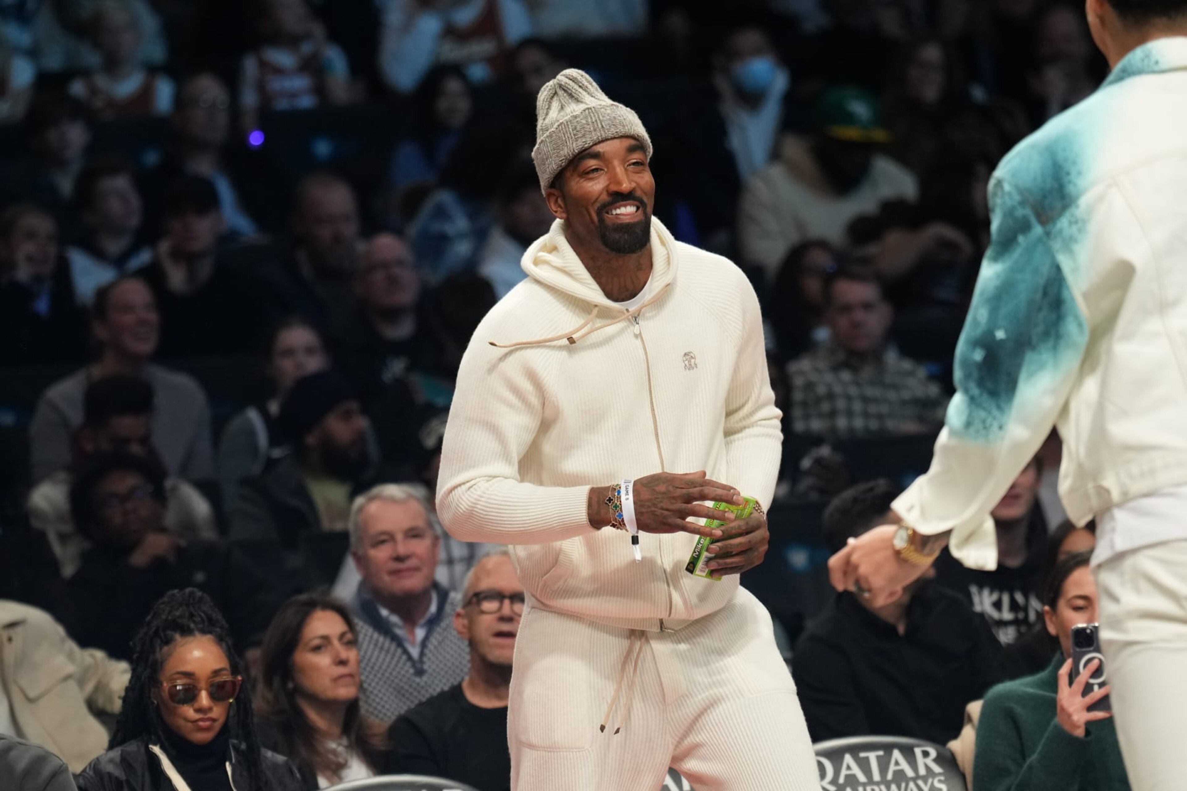 BROOKLYN, NY - NOVEMBER 20: Former NBA player JR Smith smiles during the game between the Memphis Grizzlies and the Brooklyn Nets on November 20, 2022 at Barclays Center in Brooklyn, New York. NOTE TO USER: User expressly acknowledges and agrees that, by downloading and or using this Photograph, user is consenting to the terms and conditions of the Getty Images License Agreement. Mandatory Copyright Notice: Copyright 2022 NBAE (Photo by Jesse D. Garrabrant/NBAE via Getty Images)