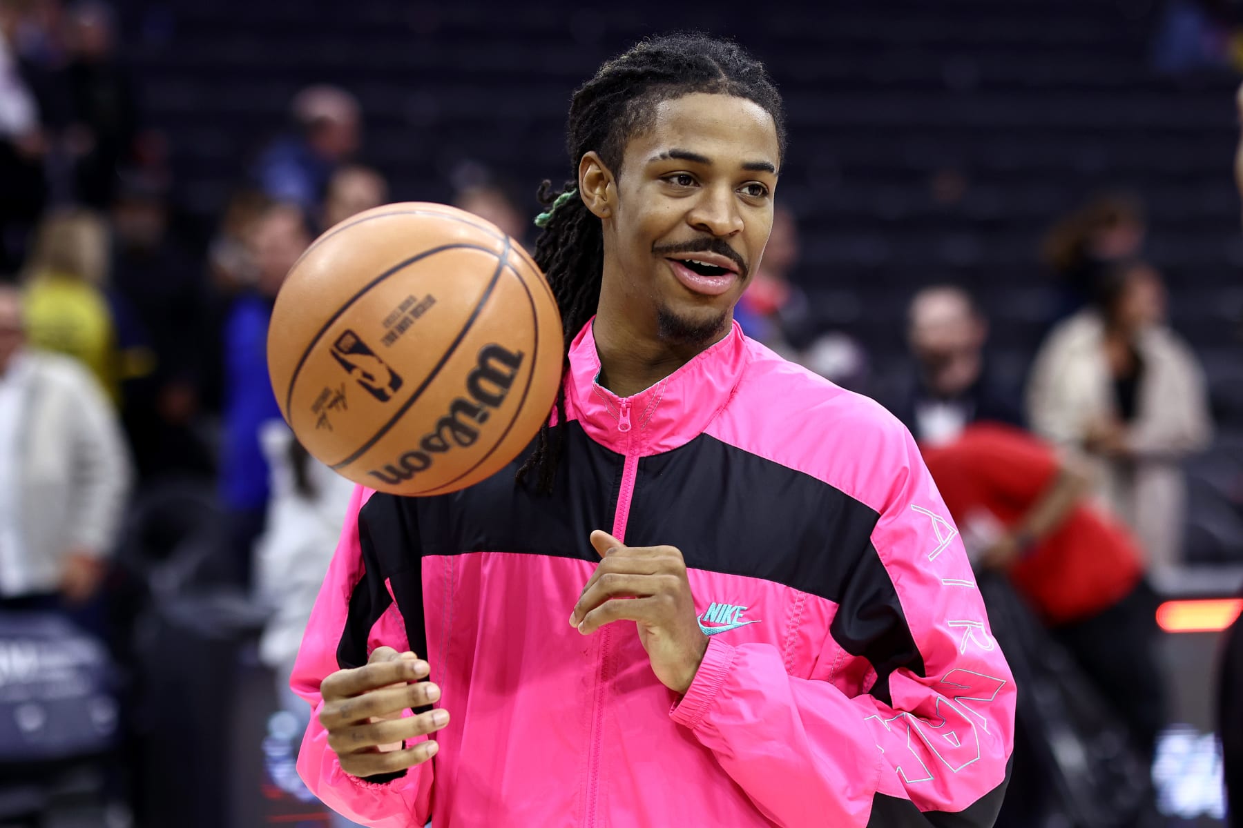 PHILADELPHIA, PENNSYLVANIA - MARCH 06: Ja Morant #12 of the Memphis Grizzlies reacts after a game against the Philadelphia 76ers at the Wells Fargo Center on March 06, 2024 in Philadelphia, Pennsylvania. NOTE TO USER: User expressly acknowledges and agrees that, by downloading and or using this photograph, User is consenting to the terms and conditions of the Getty Images License Agreement.  (Photo by Tim Nwachukwu/Getty Images)