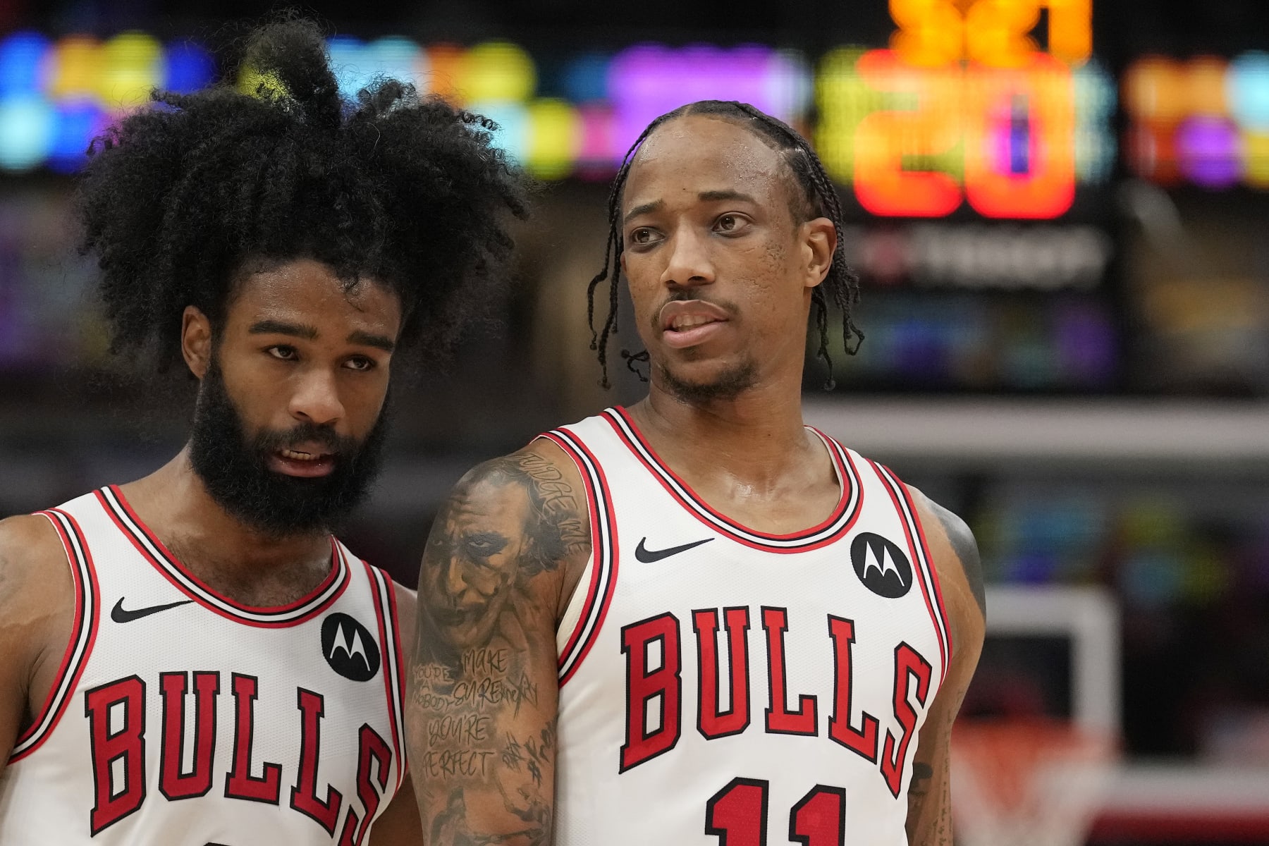 CHICAGO, ILLINOIS - MARCH 27: Coby White #0 and DeMar DeRozan #11 of the Chicago Bulls talk during the second half against the Indiana Pacers at the United Center on March 27, 2024 in Chicago, Illinois. NOTE TO USER: User expressly acknowledges and agrees that, by downloading and or using this photograph, User is consenting to the terms and conditions of the Getty Images License Agreement. (Photo by Patrick McDermott/Getty Images)