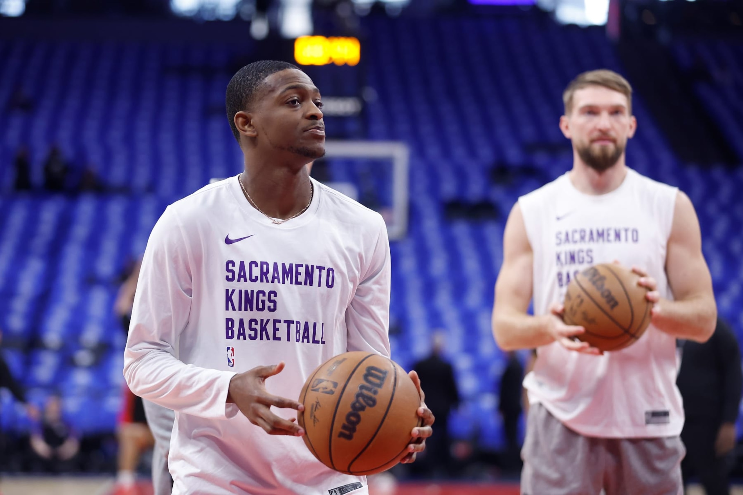 SACRAMENTO, CALIFORNIA - APRIL 14: De'Aaron Fox #5 and Domantas Sabonis #10 of the Sacramento Kings warms up before the game against the Portland Trail Blazers at Golden 1 Center on April 14, 2024 in Sacramento, California. NOTE TO USER: User expressly acknowledges and agrees that, by downloading and or using this photograph, User is consenting to the terms and conditions of the Getty Images License Agreement. (Photo by Lachlan Cunningham/Getty Images) SACRAMENTO, CALIFORNIA - APRIL 14: De'Aaron Fox #5 and Domantas Sabonis #10 of the Sacramento Kings warms up before the game against the Portland Trail Blazers at Golden 1 Center on April 14, 2024 in Sacramento, California. NOTE TO USER: User expressly acknowledges and agrees that, by downloading and or using this photograph, User is consenting to the terms and conditions of the Getty Images License Agreement. (Photo by Lachlan Cunningham/Getty Images)