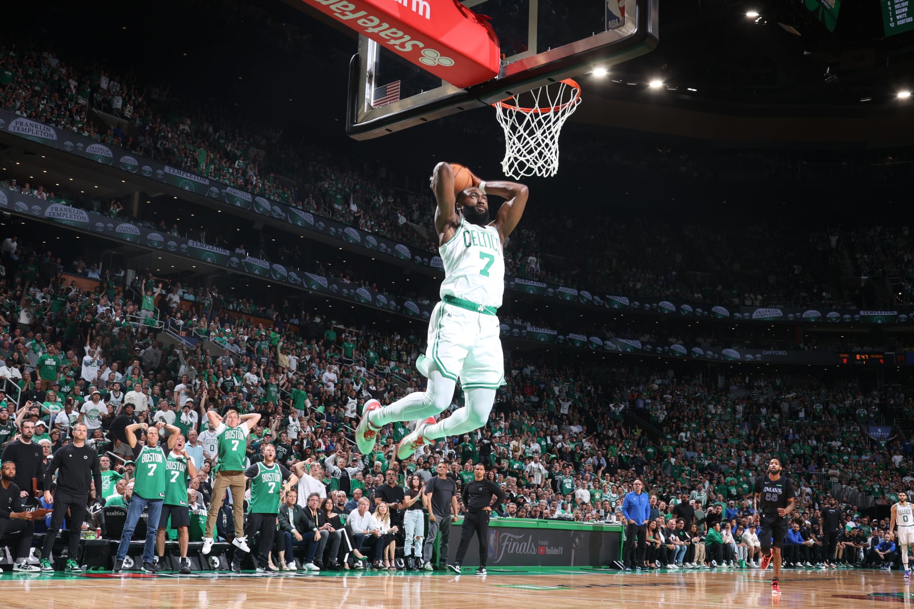BOSTON, MA - JUNE 6: Jaylen Brown #7 of the Boston Celtics dunks the ball during the game against the Dallas Mavericks during Game 1 of the 2024 NBA Finals on June 6, 2024 at the TD Garden in Boston, Massachusetts. NOTE TO USER: User expressly acknowledges and agrees that, by downloading and or using this photograph, User is consenting to the terms and conditions of the Getty Images License Agreement. Mandatory Copyright Notice: Copyright 2024 NBAE  (Photo by Nathaniel S. Butler/NBAE via Getty Images)