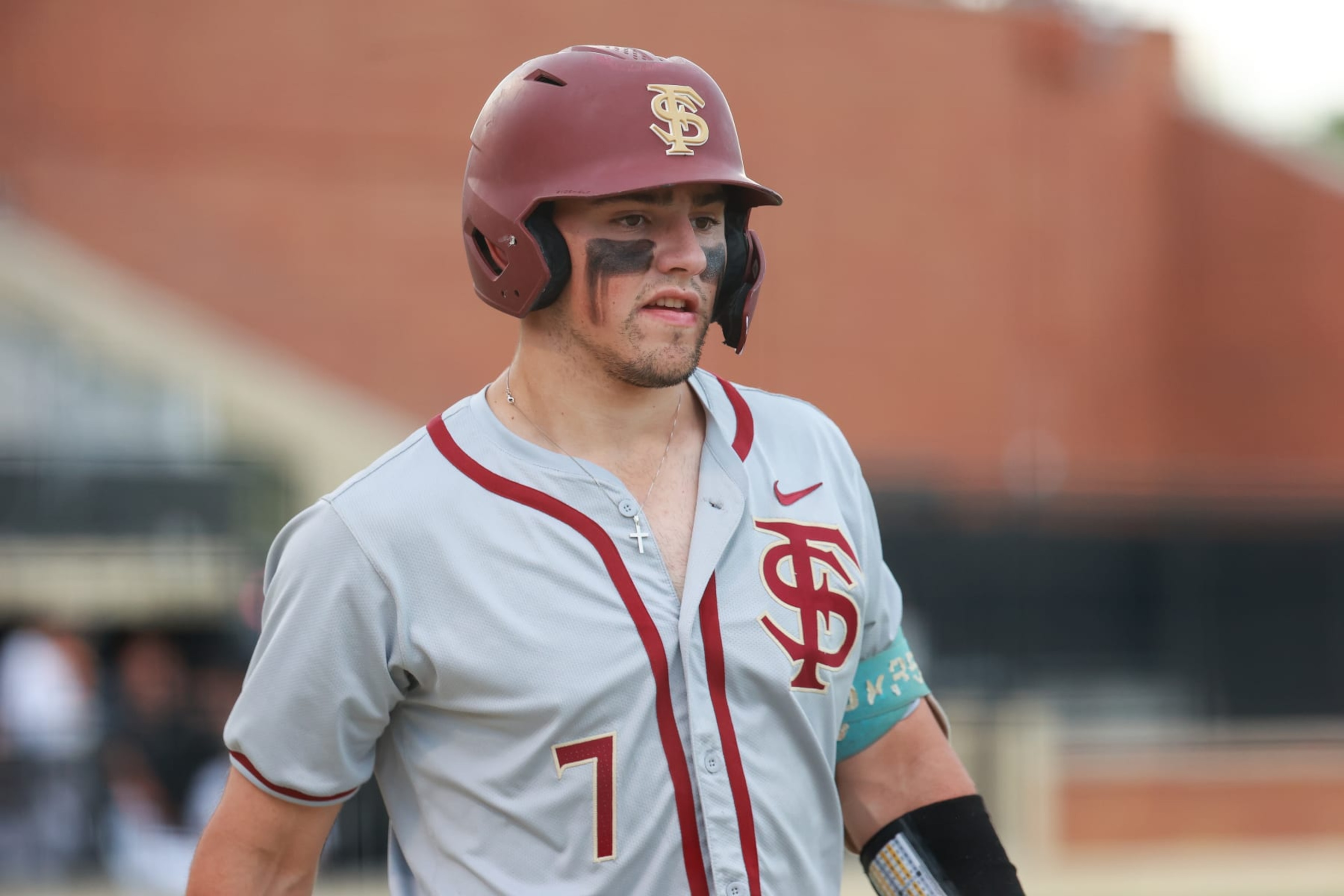 WINSTON SALEM, NORTH CAROLINA - APRIL 19: Jaime Ferrer #7 of the Florida State Seminoles looks on against the Wake Forest Demon Deacons at David F. Couch Ballpark on April 19, 2024 in Winston Salem, North Carolina. (Photo by Isaiah Vazquez/Getty Images)