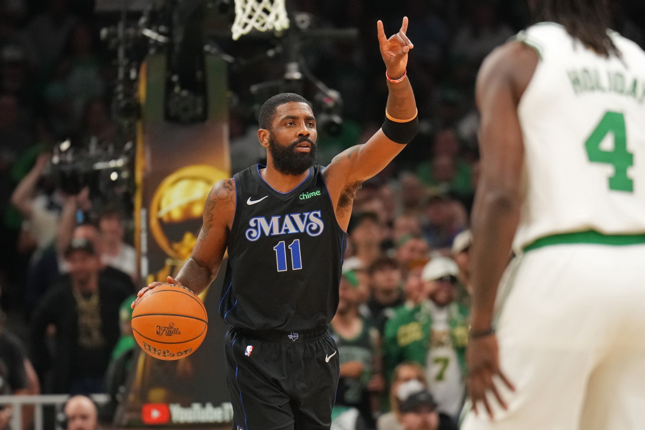 BOSTON, MA - JUNE 6: Kyrie Irving #11 of the Dallas Mavericks handles the ball during the game against the Boston Celtics during Game 1 of the 2024 NBA Finals on June 6, 2024 at the TD Garden in Boston, Massachusetts. NOTE TO USER: User expressly acknowledges and agrees that, by downloading and or using this photograph, User is consenting to the terms and conditions of the Getty Images License Agreement. Mandatory Copyright Notice: Copyright 2024 NBAE (Photo by Jesse D. Garrabrant/NBAE via Getty Images) BOSTON, MA - JUNE 6: Kyrie Irving #11 of the Dallas Mavericks handles the ball during the game against the Boston Celtics during Game 1 of the 2024 NBA Finals on June 6, 2024 at the TD Garden in Boston, Massachusetts. NOTE TO USER: User expressly acknowledges and agrees that, by downloading and or using this photograph, User is consenting to the terms and conditions of the Getty Images License Agreement. Mandatory Copyright Notice: Copyright 2024 NBAE (Photo by Jesse D. Garrabrant/NBAE via Getty Images)