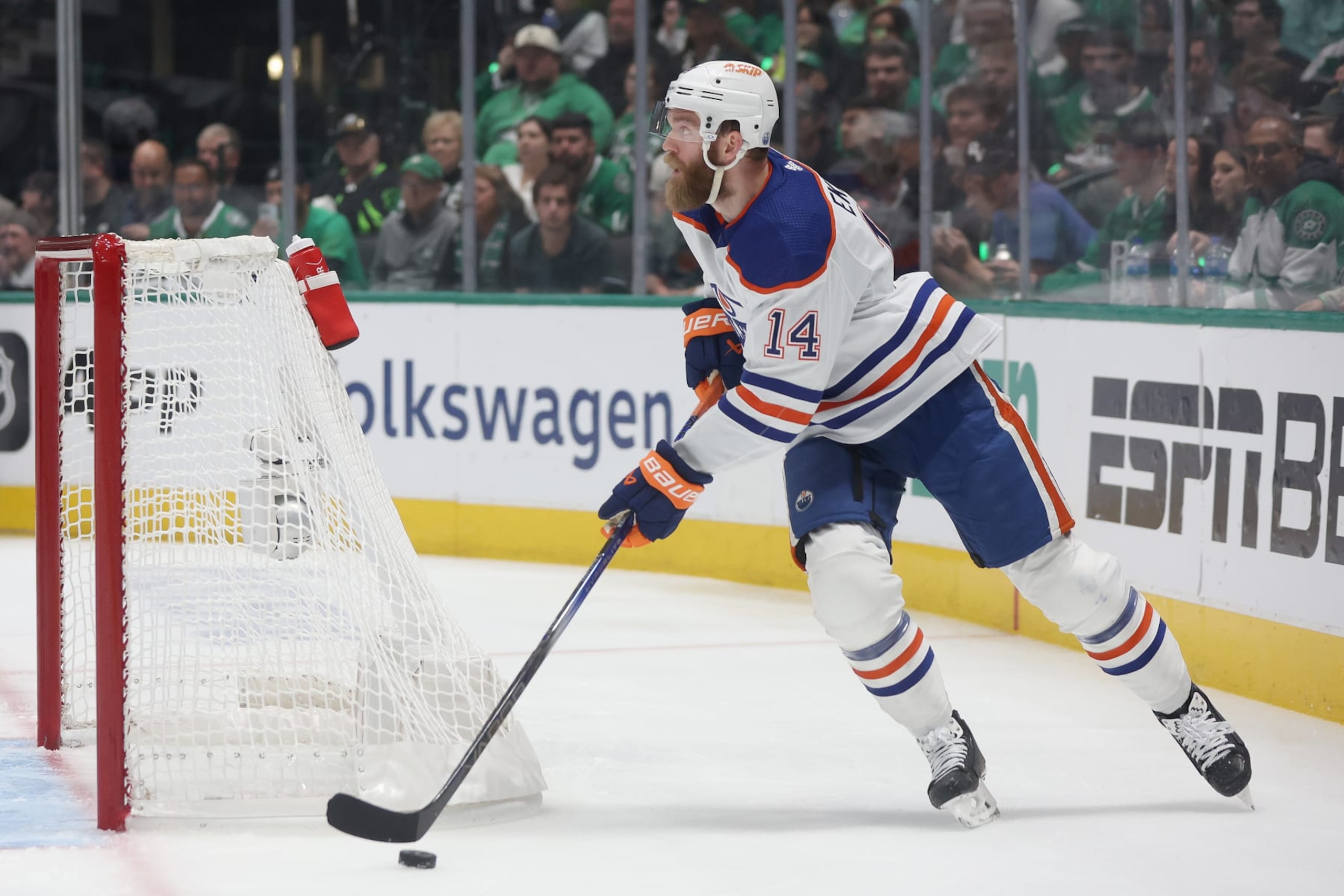 DALLAS, TEXAS - MAY 31: Mattias Ekholm #14 of the Edmonton Oilers brings the puck off the boards against the Dallas Stars in the first period during Game Five of the Western Conference Final of the 2024 Stanley Cup Playoffs at American Airlines Center on May 31, 2024 in Dallas, Texas. (Photo by Matthew Stockman/Getty Images)