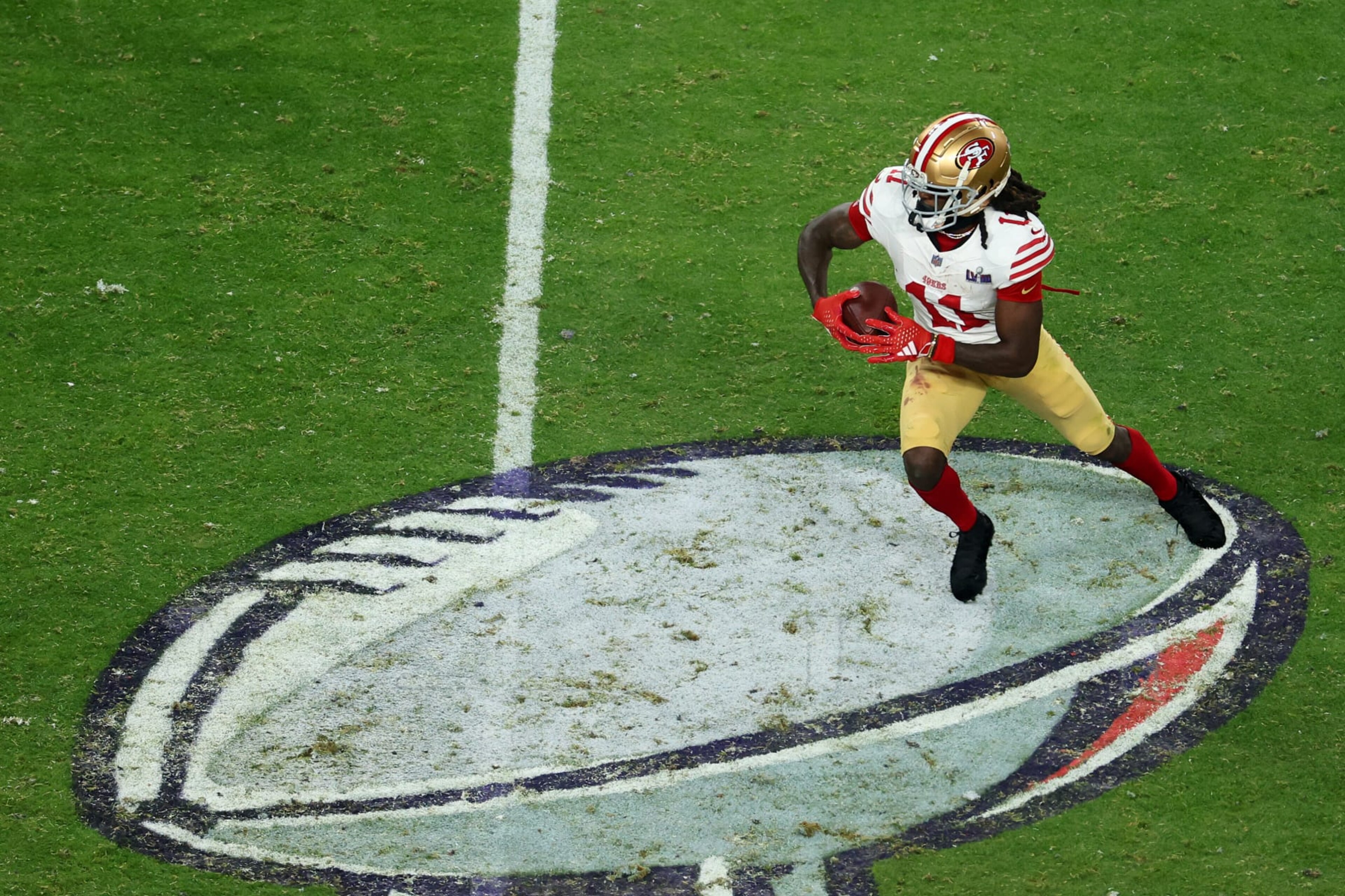LAS VEGAS, NEVADA - FEBRUARY 11: Brandon Aiyuk #11 of the San Francisco 49ers runs the ball after a catch during the fourth quarter against the Kansas City Chiefs during Super Bowl LVIII at Allegiant Stadium on February 11, 2024 in Las Vegas, Nevada. (Photo by Michael Reaves/Getty Images)