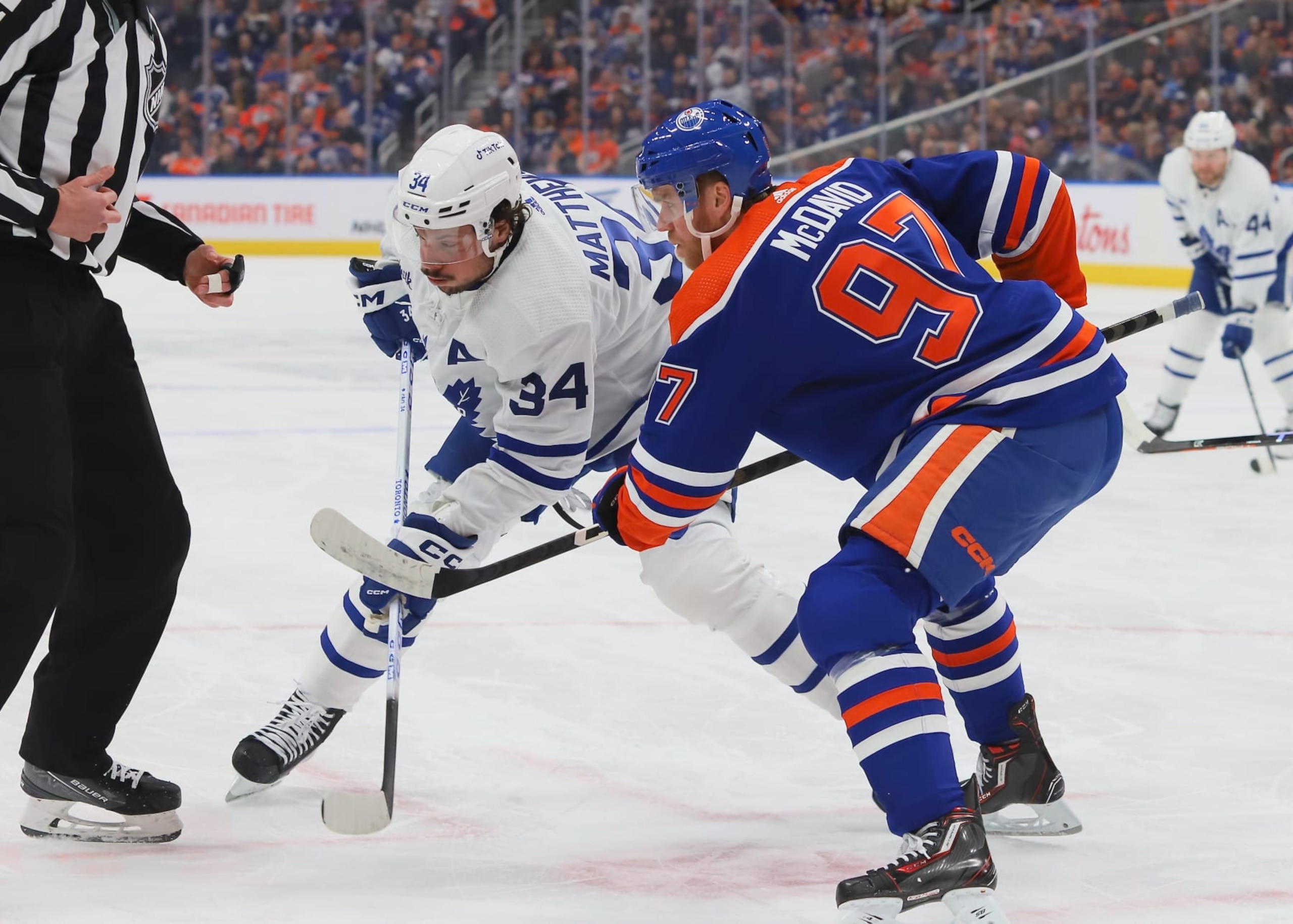 EDMONTON, CANADA - MARCH 1: Auston Matthews #34 of the Toronto Maple Leafs faces off against Connor McDavid #97 of the Edmonton Oilers in the first period at Rogers Place on March 1, 2023 in Edmonton, Alberta, Canada. (Photo by Lawrence Scott/Getty Images)