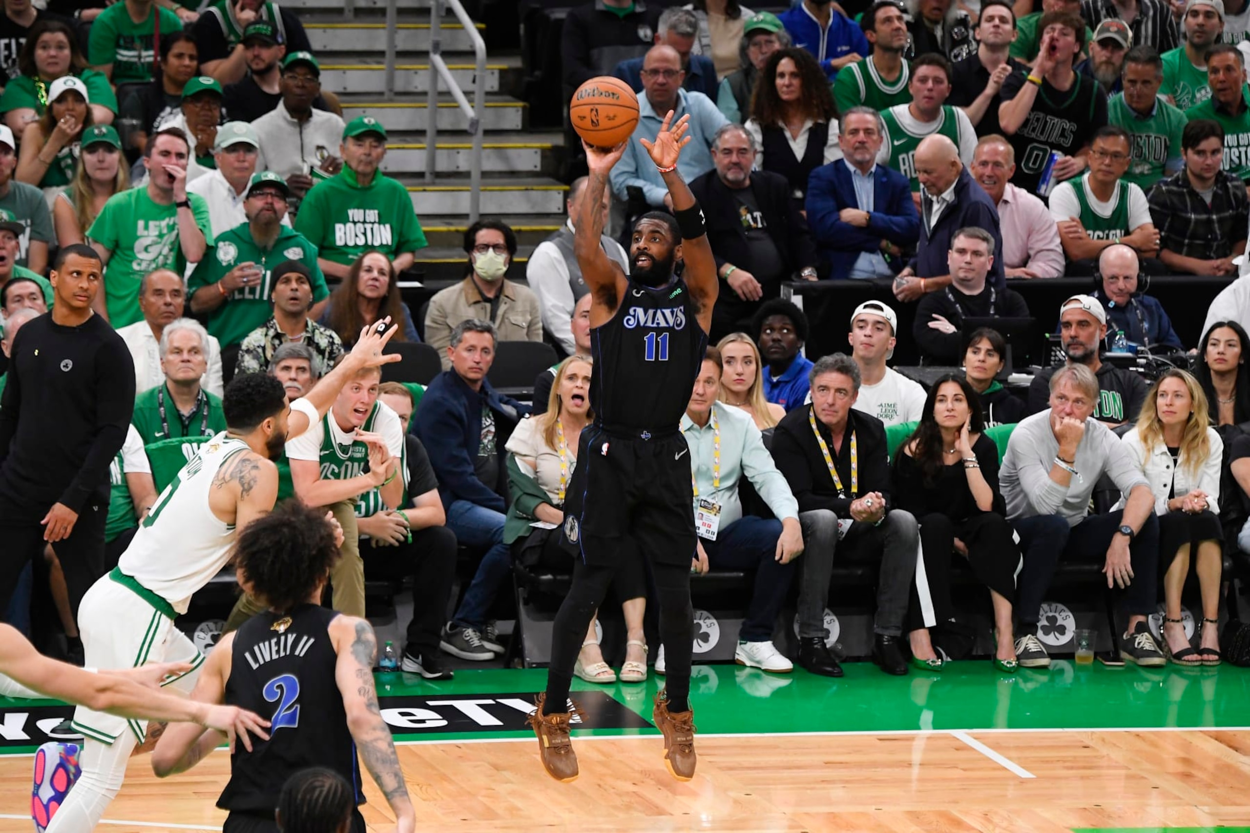 BOSTON, MA - JUNE 6: Kyrie Irving #11 of the Dallas Mavericks shoots the ball during the game against the Boston Celtics during Game 1 of the 2024 NBA Finals on June 6, 2024 at the TD Garden in Boston, Massachusetts. NOTE TO USER: User expressly acknowledges and agrees that, by downloading and or using this photograph, User is consenting to the terms and conditions of the Getty Images License Agreement. Mandatory Copyright Notice: Copyright 2024 NBAE  (Photo by Brian Babineau/NBAE via Getty Images)