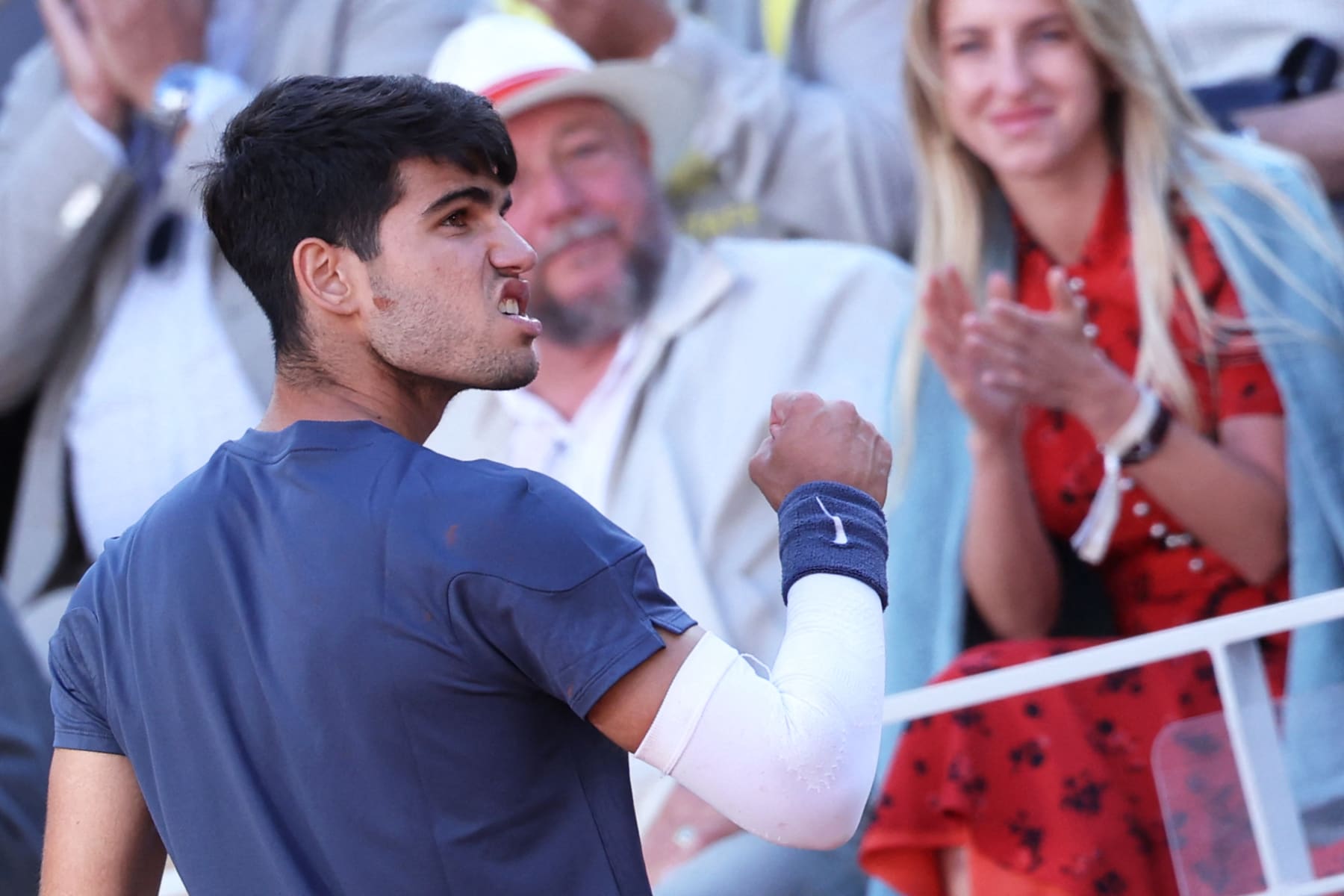 Spain's Carlos Alcaraz reacts after a point during his men's singles final match against Germany's Alexander Zverev on Court Philippe-Chatrier on day fifteen of the French Open tennis tournament at the Roland Garros Complex in Paris on June 9, 2024. (Photo by ALAIN JOCARD / AFP) (Photo by ALAIN JOCARD/AFP via Getty Images)