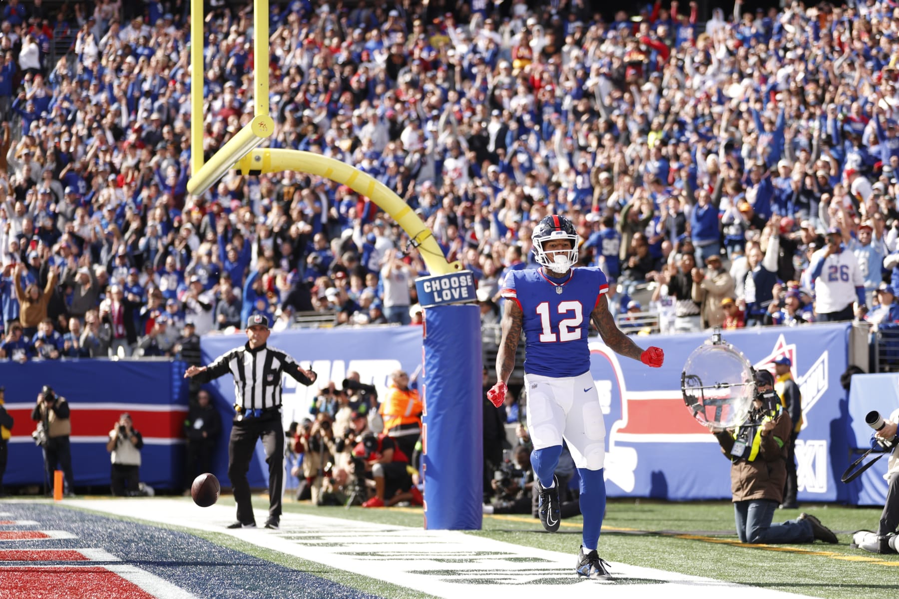 EAST RUTHERFORD, NEW JERSEY - OCTOBER 22: Darren Waller #12 of the New York Giants celebrates after scoring a touchdown in the second quarter of the game against the Washington Commanders at MetLife Stadium on October 22, 2023 in East Rutherford, New Jersey. (Photo by Sarah Stier/Getty Images)