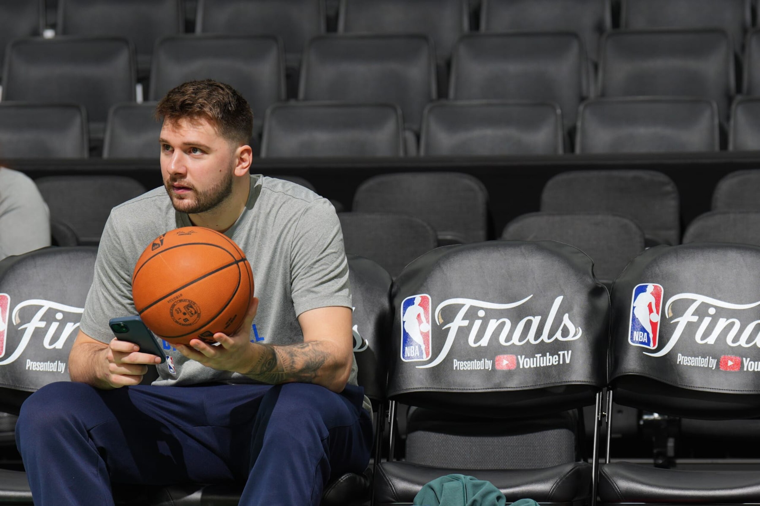 BOSTON, MA - JUNE 8: Luka Doncic #77 of the Dallas Mavericks looks on during 2024 NBA Finals Practice and Media Availability on June 8, 2024 at the TD Garden in Boston, Massachusetts. NOTE TO USER: User expressly acknowledges and agrees that, by downloading and or using this photograph, User is consenting to the terms and conditions of the Getty Images License Agreement. Mandatory Copyright Notice: Copyright 2024 NBAE (Photo by Jesse D. Garrabrant/NBAE via Getty Images)