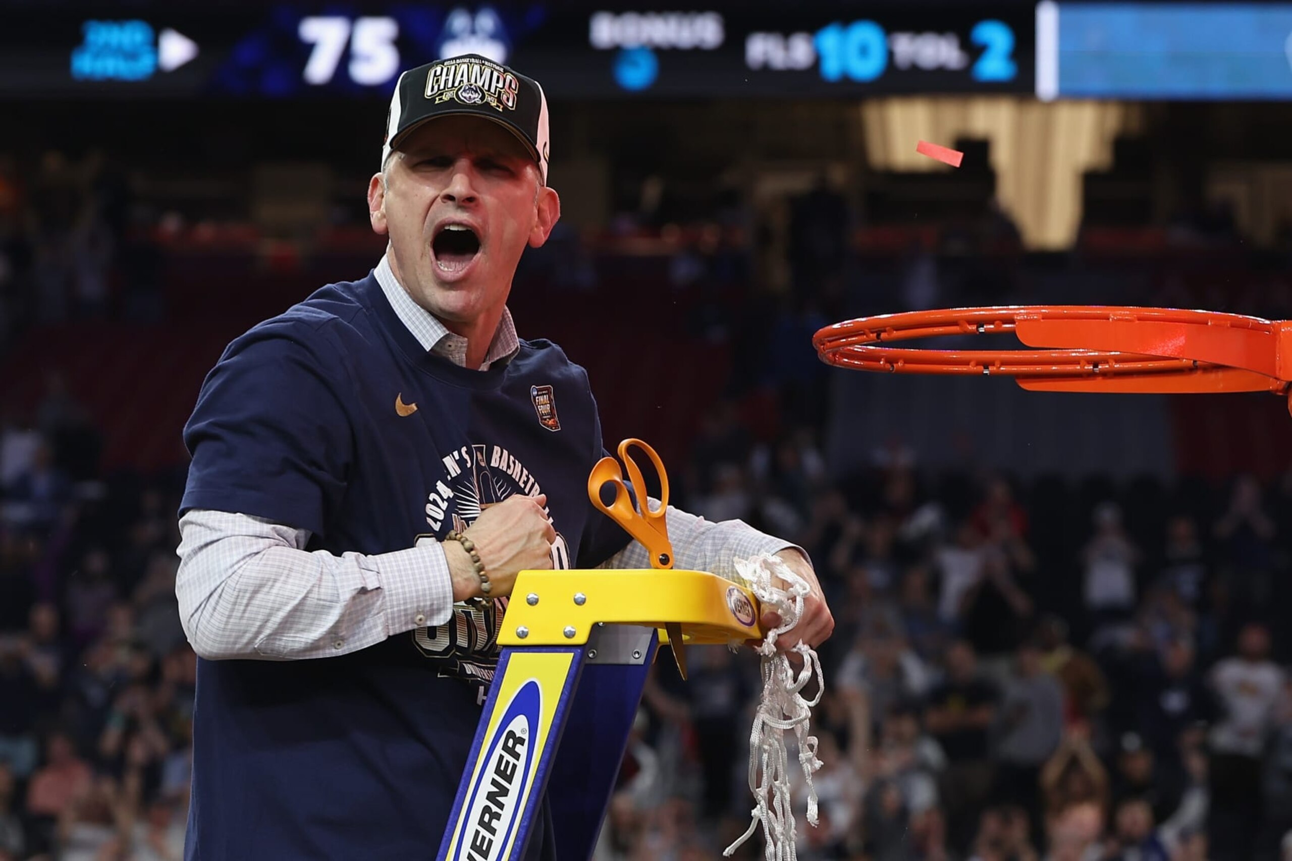 GLENDALE, ARIZONA - APRIL 08: Head coach Dan Hurley of the Connecticut Huskies cuts down the net after beating the Purdue Boilermakers 75-60 to win the NCAA Men's Basketball Tournament National Championship game at State Farm Stadium on April 08, 2024 in Glendale, Arizona. (Photo by Christian Petersen/Getty Images) GLENDALE, ARIZONA - APRIL 08: Head coach Dan Hurley of the Connecticut Huskies cuts down the net after beating the Purdue Boilermakers 75-60 to win the NCAA Men's Basketball Tournament National Championship game at State Farm Stadium on April 08, 2024 in Glendale, Arizona. (Photo by Christian Petersen/Getty Images)