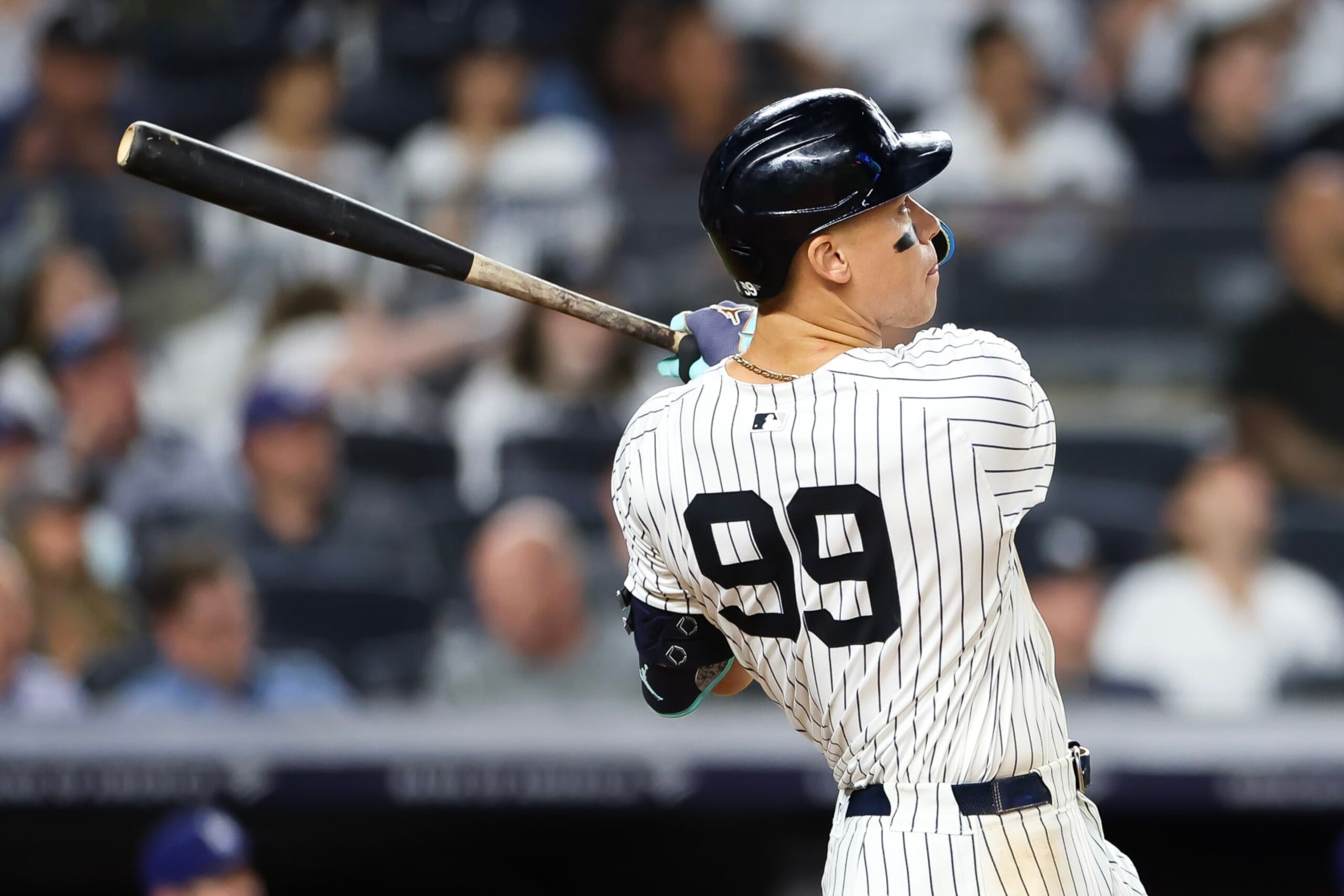 NEW YORK, NEW YORK - JUNE 09: Aaron Judge #99 of the New York Yankees hits a solo home run against the Los Angeles Dodgers during the eighth inning  at Yankee Stadium on June 09, 2024 in the Bronx borough of New York City. (Photo by Luke Hales/Getty Images)