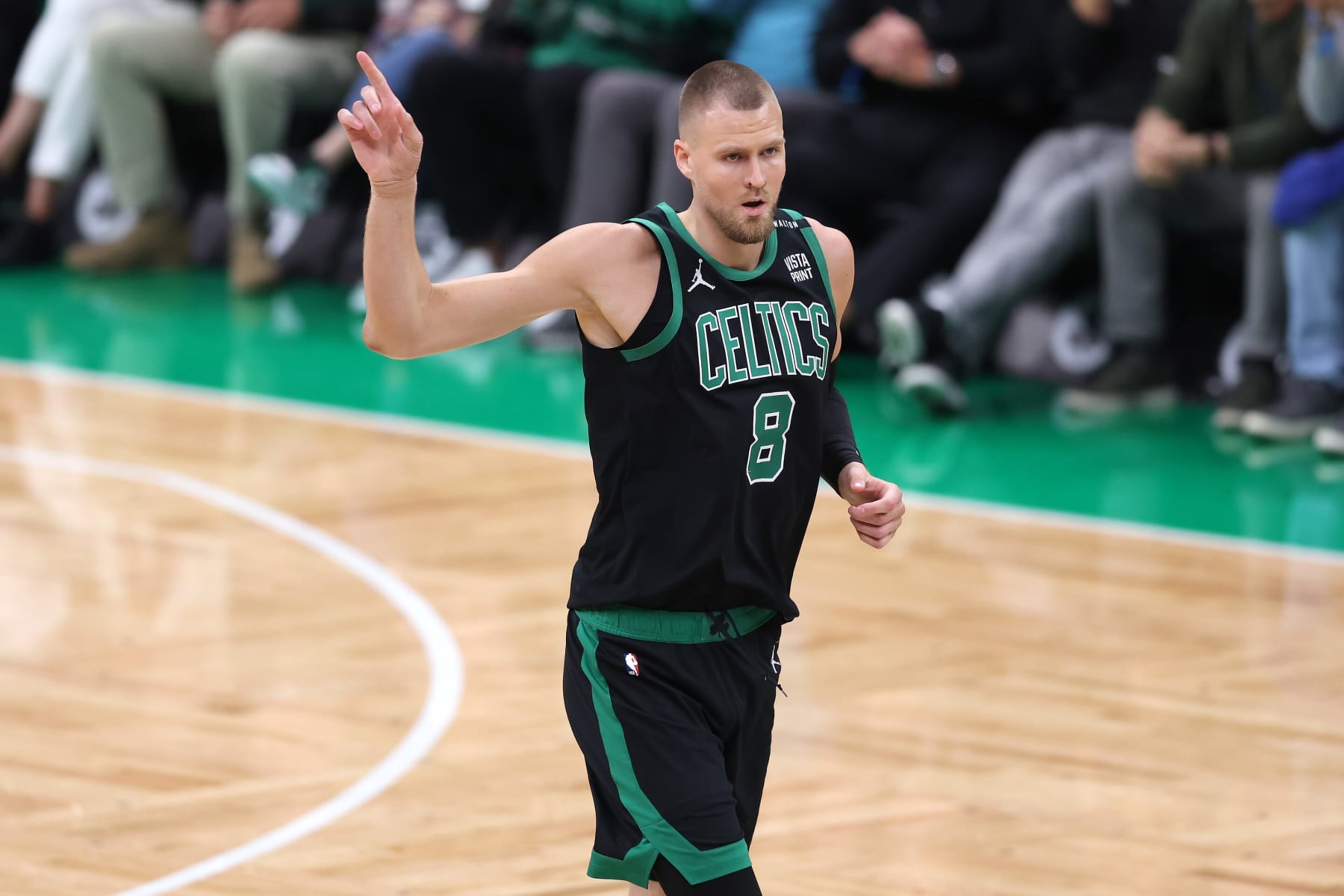 BOSTON, MASSACHUSETTS - JUNE 09: Kristaps Porzingis #8 of the Boston Celtics reacts during the first quarter against the Dallas Mavericks in Game Two of the 2024 NBA Finals at TD Garden on June 09, 2024 in Boston, Massachusetts. NOTE TO USER: User expressly acknowledges and agrees that, by downloading and or using this photograph, User is consenting to the terms and conditions of the Getty Images License Agreement. (Photo by Adam Glanzman/Getty Images) BOSTON, MASSACHUSETTS - JUNE 09: Kristaps Porzingis #8 of the Boston Celtics reacts during the first quarter against the Dallas Mavericks in Game Two of the 2024 NBA Finals at TD Garden on June 09, 2024 in Boston, Massachusetts. NOTE TO USER: User expressly acknowledges and agrees that, by downloading and or using this photograph, User is consenting to the terms and conditions of the Getty Images License Agreement. (Photo by Adam Glanzman/Getty Images)