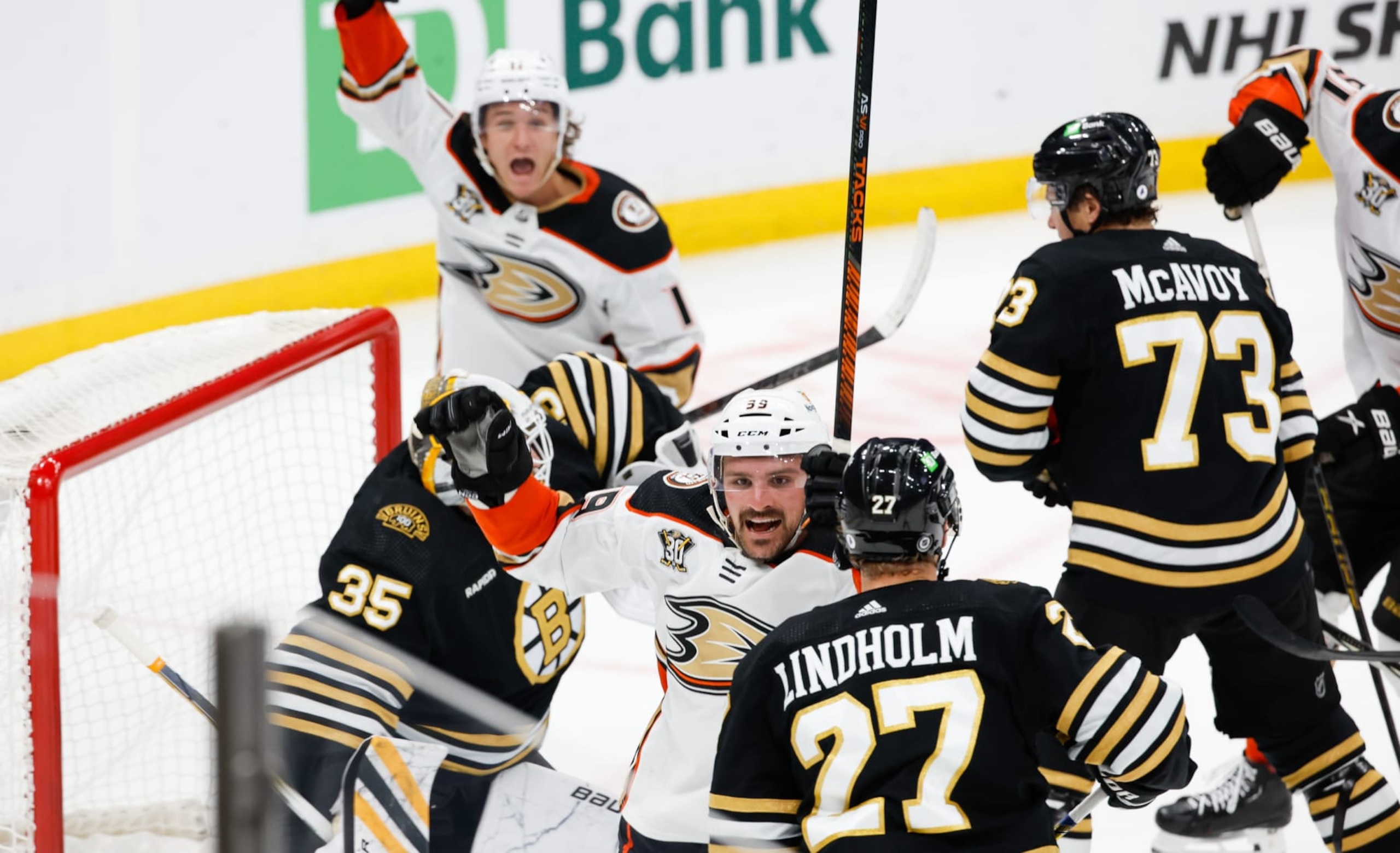 BOSTON, MASSACHUSETTS - OCTOBER 26: Sam Carrick #39 of the Anaheim Ducks and Trevor Zegras #11 both of the Anaheim Ducks celebrate a goal by their teammate Troy Terry #19 to tie the game in the final minute against Linus Ullmark #35 of the Boston Bruins at the TD Garden on October 26, 2023 in Boston, Massachusetts. The Ducks won 4-3 in overtime. (Photo by Richard T Gagnon/Getty Images) BOSTON, MASSACHUSETTS - OCTOBER 26: Sam Carrick #39 of the Anaheim Ducks and Trevor Zegras #11 both of the Anaheim Ducks celebrate a goal by their teammate Troy Terry #19 to tie the game in the final minute against Linus Ullmark #35 of the Boston Bruins at the TD Garden on October 26, 2023 in Boston, Massachusetts. The Ducks won 4-3 in overtime. (Photo by Richard T Gagnon/Getty Images)