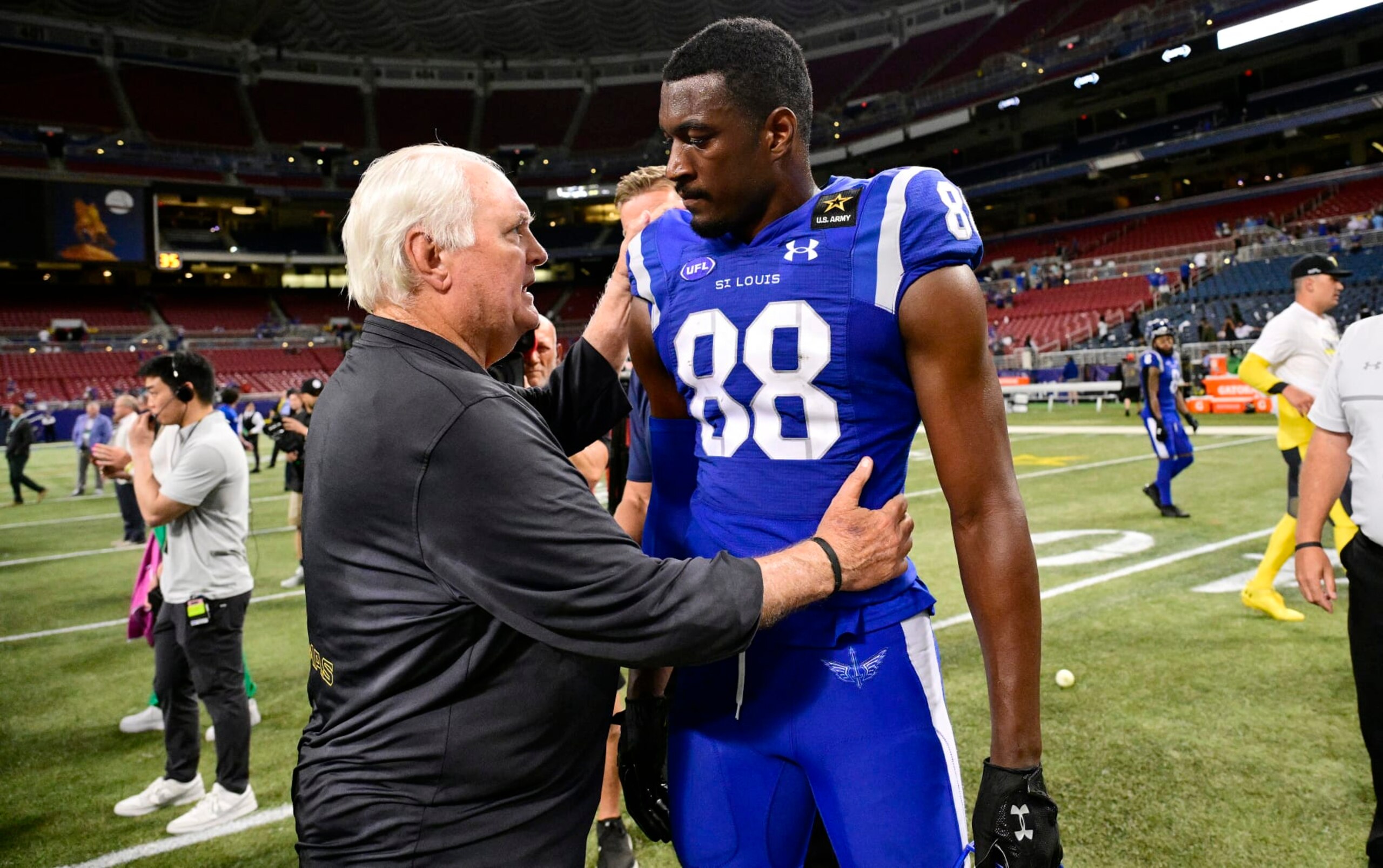 ST LOUIS, MISSOURI - JUNE 09: Head coach Wade Phillips of the San Antonio Brahmas talks with Hakeem Butler #88 of the St. Louis Battlehawks after a win during the XFL Conference Championship Game at The Dome at America’s Center on June 09, 2024 in St Louis, Missouri. (Photo by Scott Rovak/UFL/Getty Images)