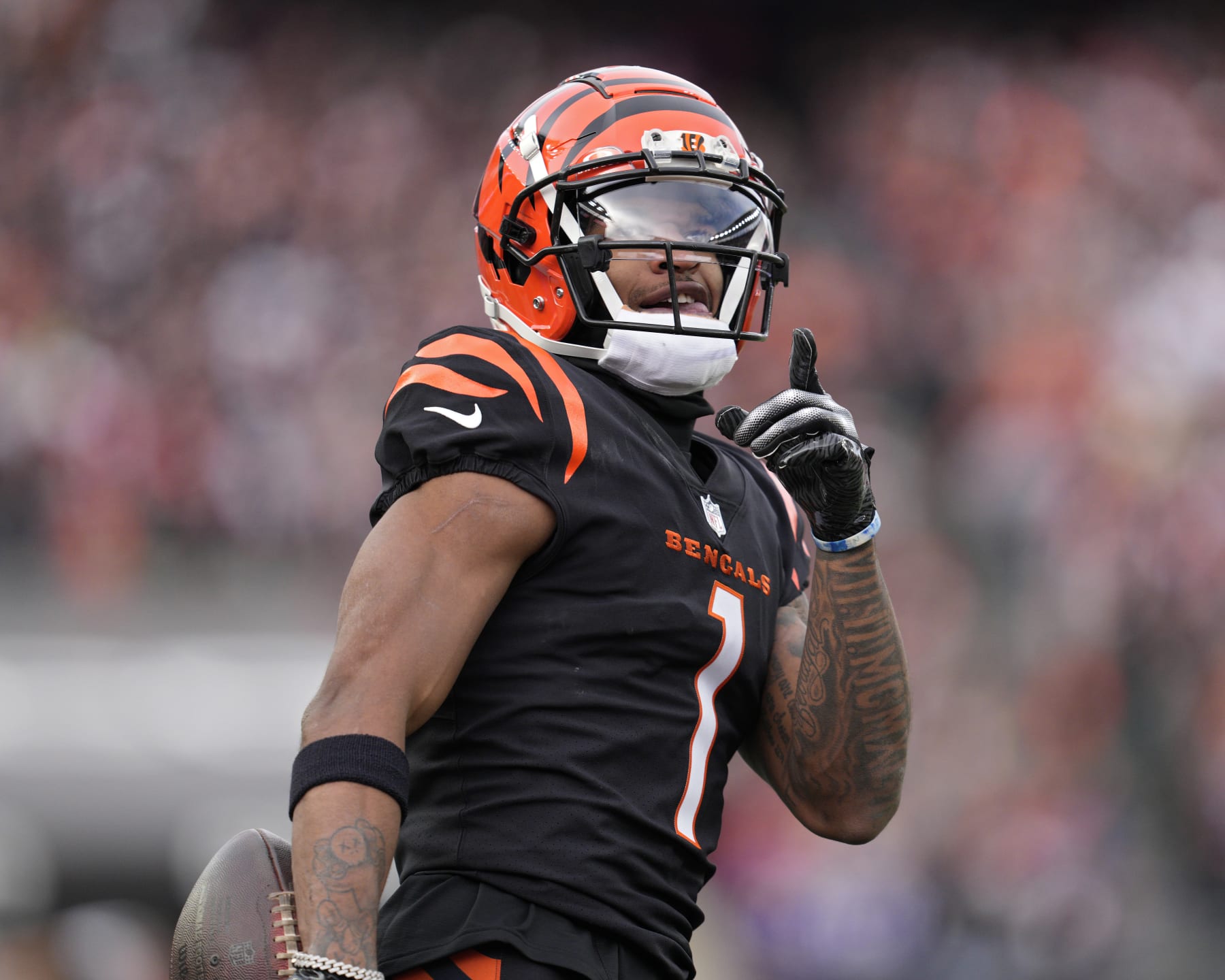 CINCINNATI, OHIO - DECEMBER 16: Ja'Marr Chase #1 of the Cincinnati Bengals reacts after making a catch during a NFL football game against the Minnesota Vikings at Paycor Stadium on December 16, 2023 in Cincinnati, Ohio. (Photo by Jeff Dean/Getty Images)