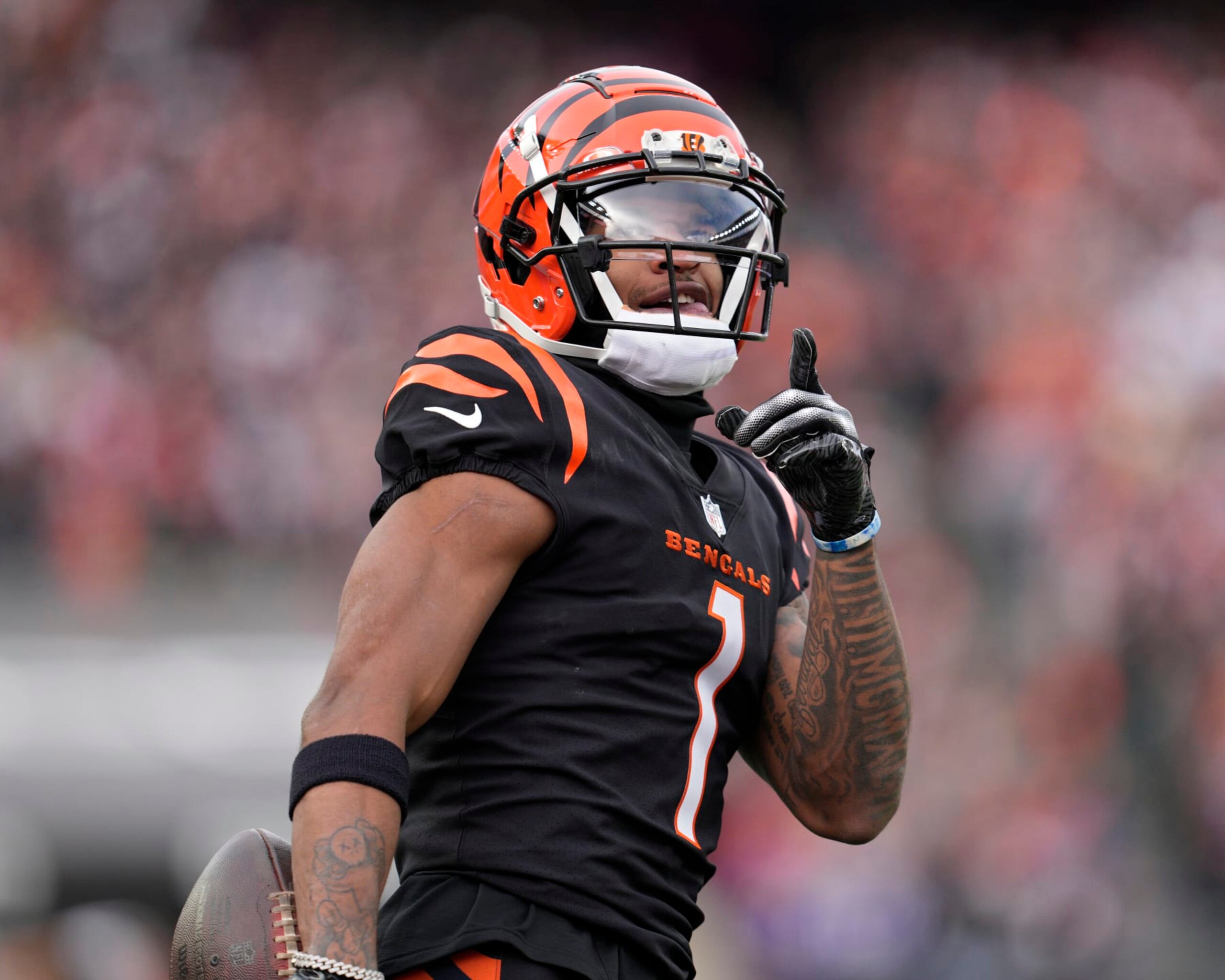 CINCINNATI, OHIO - DECEMBER 16: Ja'Marr Chase #1 of the Cincinnati Bengals reacts after making a catch during a NFL football game against the Minnesota Vikings at Paycor Stadium on December 16, 2023 in Cincinnati, Ohio. (Photo by Jeff Dean/Getty Images)