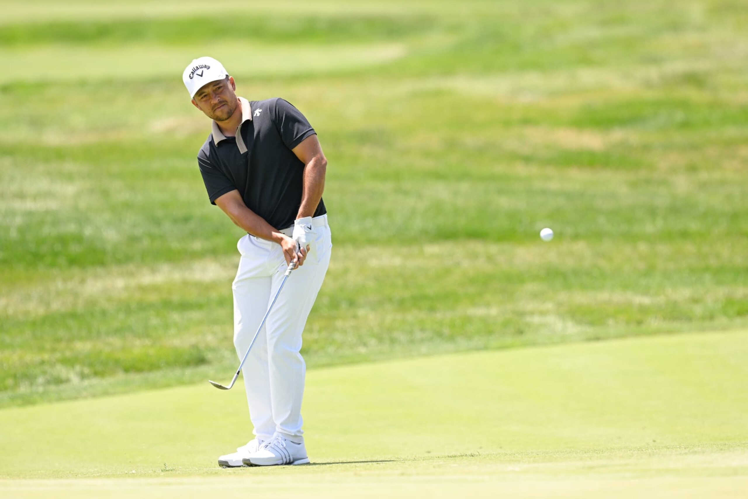 DUBLIN, OHIO - JUNE 09: Xander Schauffele warms up on the chipping green during the final round of the Memorial Tournament presented by Workday at Muirfield Village Golf Club on June 9, 2024 in Dublin, Ohio. (Photo by Ben Jared/PGA TOUR via Getty Images) DUBLIN, OHIO - JUNE 09: Xander Schauffele warms up on the chipping green during the final round of the Memorial Tournament presented by Workday at Muirfield Village Golf Club on June 9, 2024 in Dublin, Ohio. (Photo by Ben Jared/PGA TOUR via Getty Images)