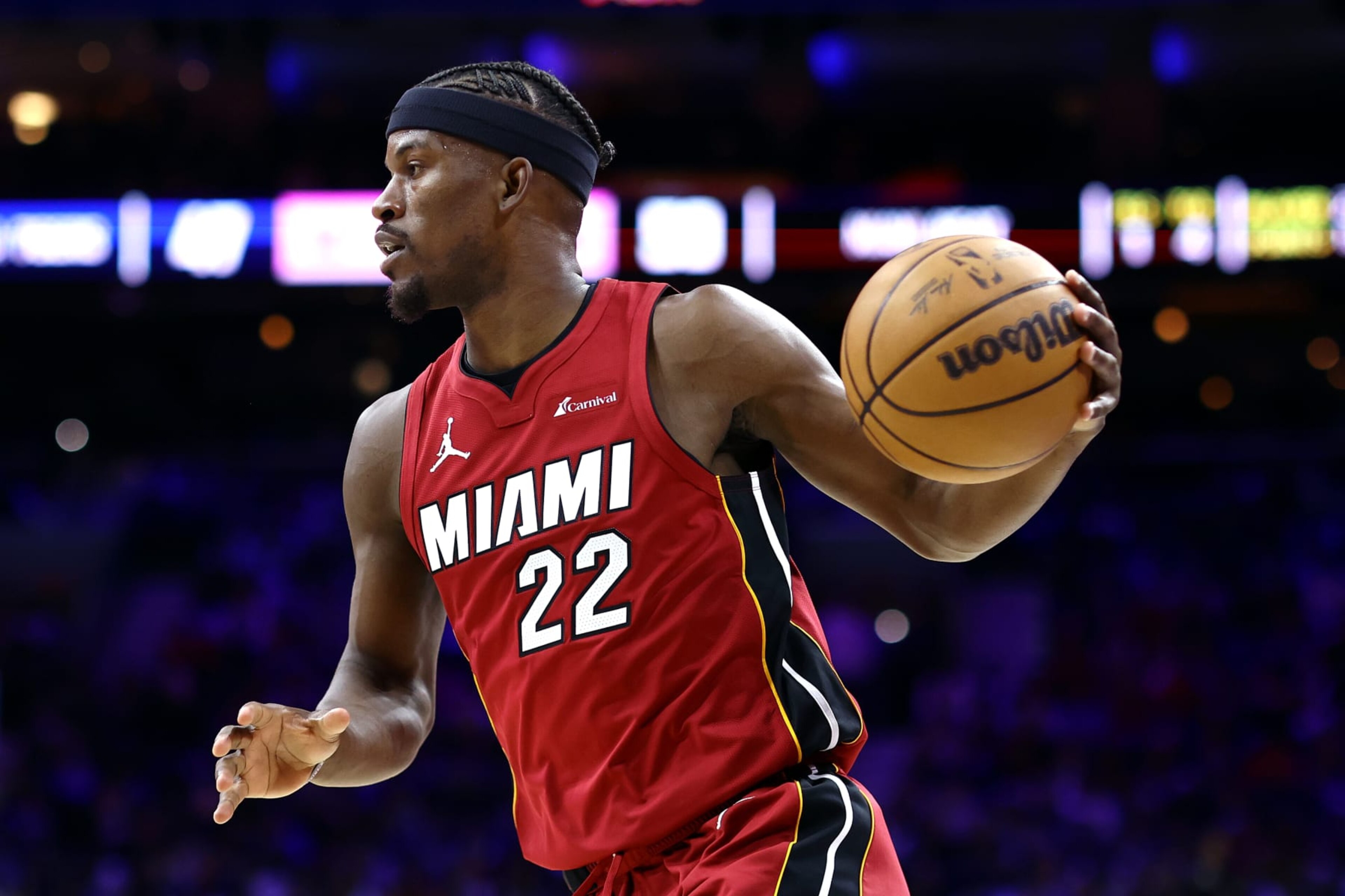 PHILADELPHIA, PENNSYLVANIA - APRIL 17: Jimmy Butler #22 of the Miami Heat dribbles during the third quarter against the Philadelphia 76ers during the Eastern Conference Play-In Tournament at the Wells Fargo Center on April 17, 2024 in Philadelphia, Pennsylvania. NOTE TO USER: User expressly acknowledges and agrees that, by downloading and or using this photograph, User is consenting to the terms and conditions of the Getty Images License Agreement. (Photo by Tim Nwachukwu/Getty Images)