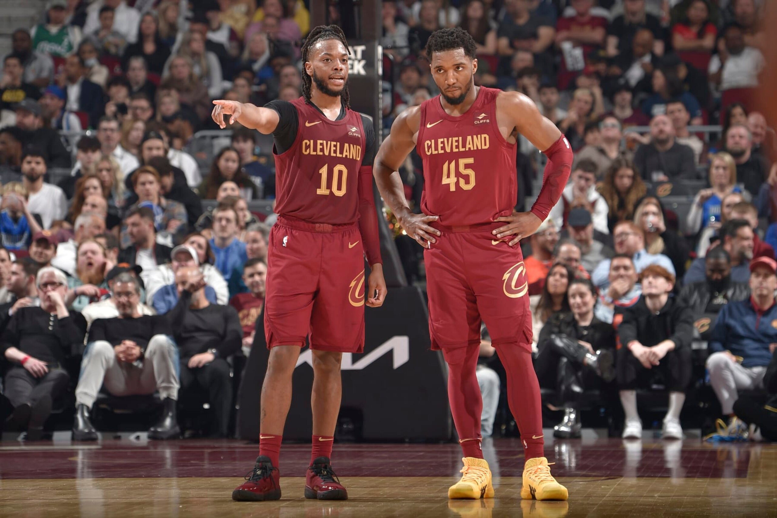 CLEVELAND, OH - FEBRUARY 27: Darius Garland #10 and Donovan Mitchell #45 of the Cleveland Cavaliers talk during the game against the Dallas Mavericks on February 27, 2024 at Rocket Mortgage FieldHouse in Cleveland, Ohio. NOTE TO USER: User expressly acknowledges and agrees that, by downloading and/or using this Photograph, user is consenting to the terms and conditions of the Getty Images License Agreement. Mandatory Copyright Notice: Copyright 2024 NBAE (Photo by David Liam Kyle/NBAE via Getty Images)