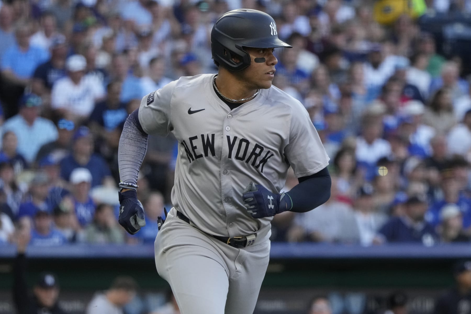 KANSAS CITY, MISSOURI - JUNE 10: Juan Soto #22 of the New York Yankees runs to first after hitting a single in the first inning against the Kansas City Royals at Kauffman Stadium on June 10, 2024 in Kansas City, Missouri. (Photo by Ed Zurga/Getty Images)