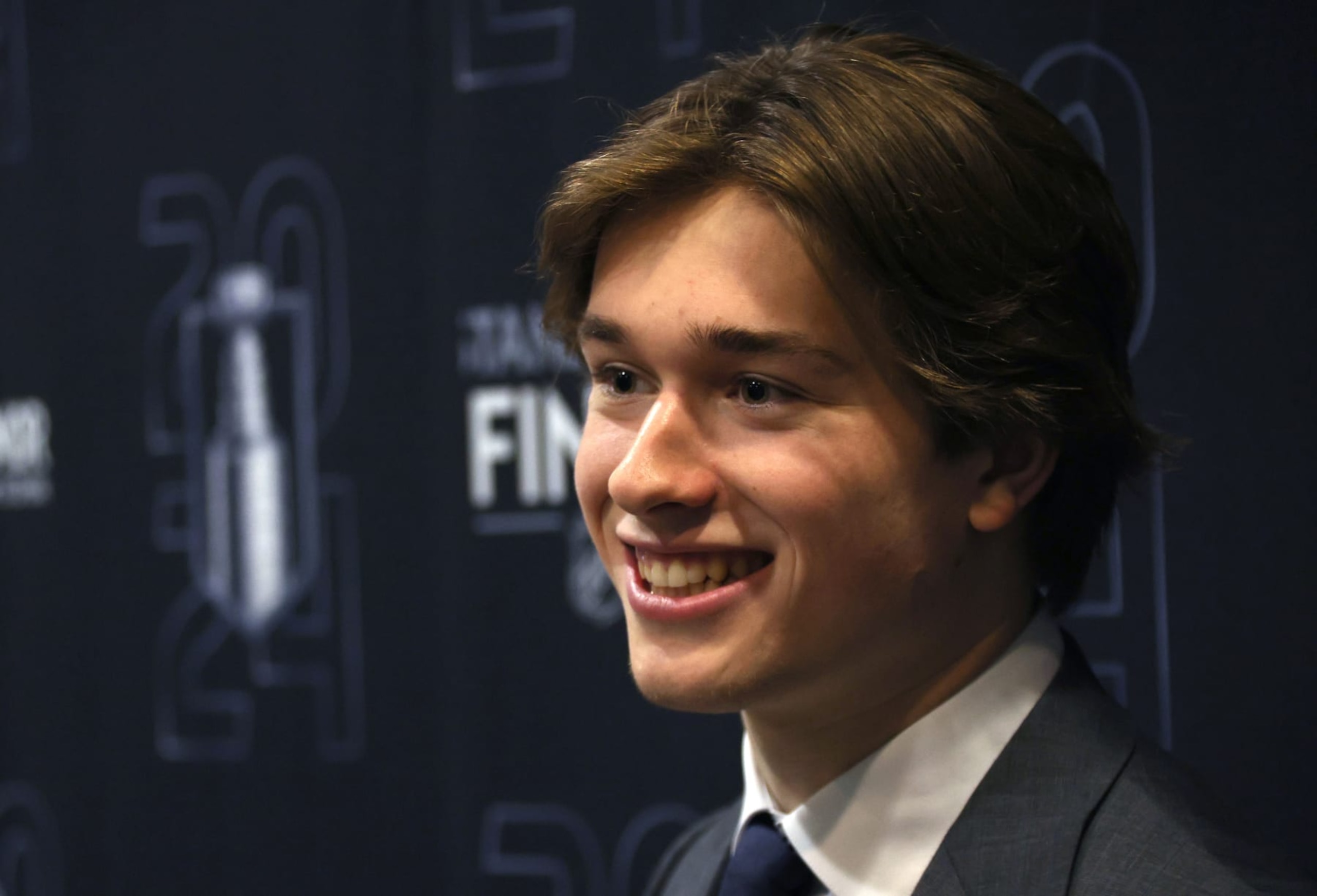 SUNRISE, FLORIDA - JUNE 10: NHL Top Draft Prospect Macklin Celebrini speaks to the media before Game Two of the 2024 Stanley Cup Final between the Edmonton Oilers and the Florida Panthers at Amerant Bank Arena on June 10, 2024 in Sunrise, Florida. (Photo by Dave Sandford/NHLI via Getty Images)